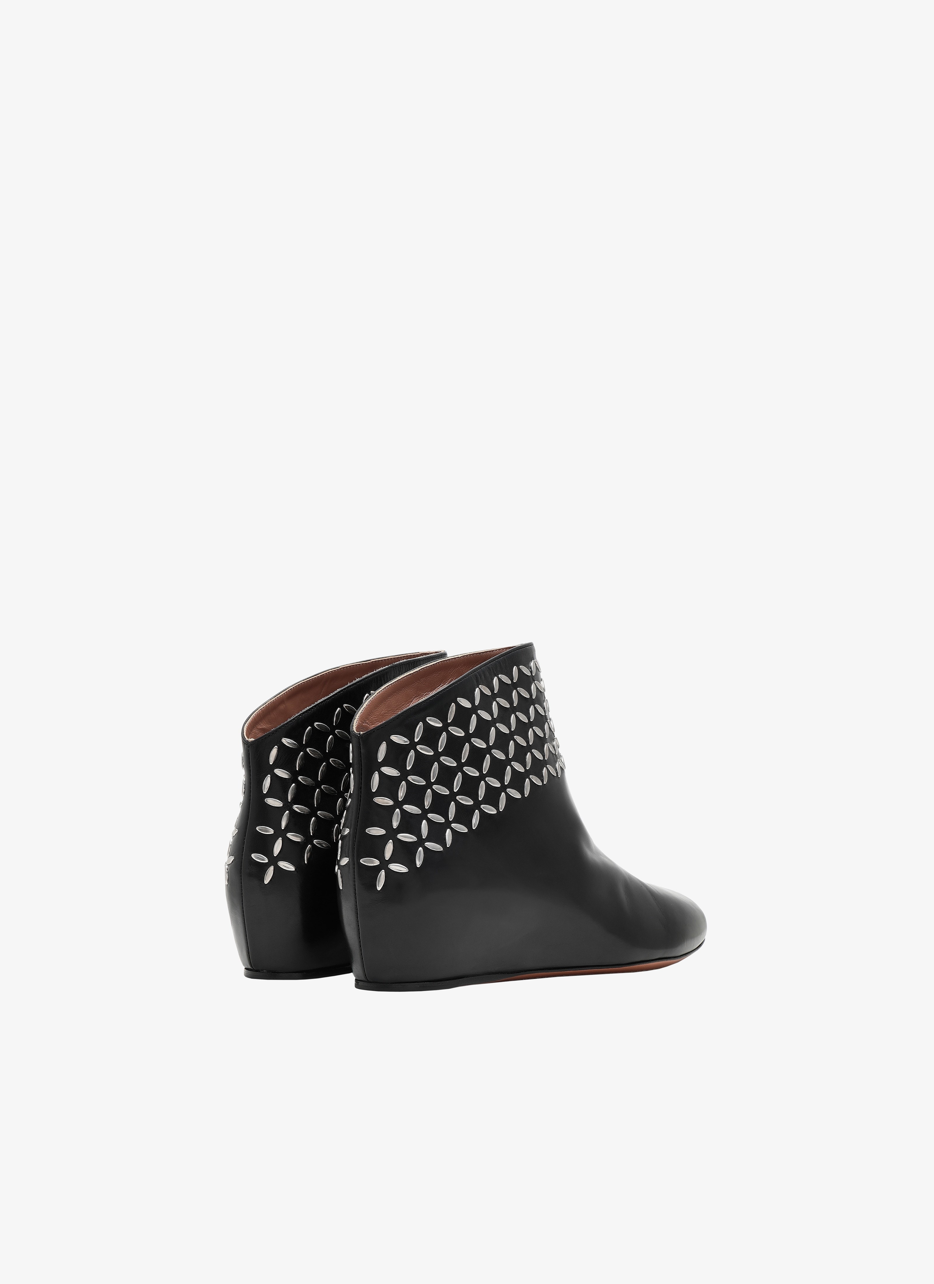 Alaia studded ankle boots 2025
