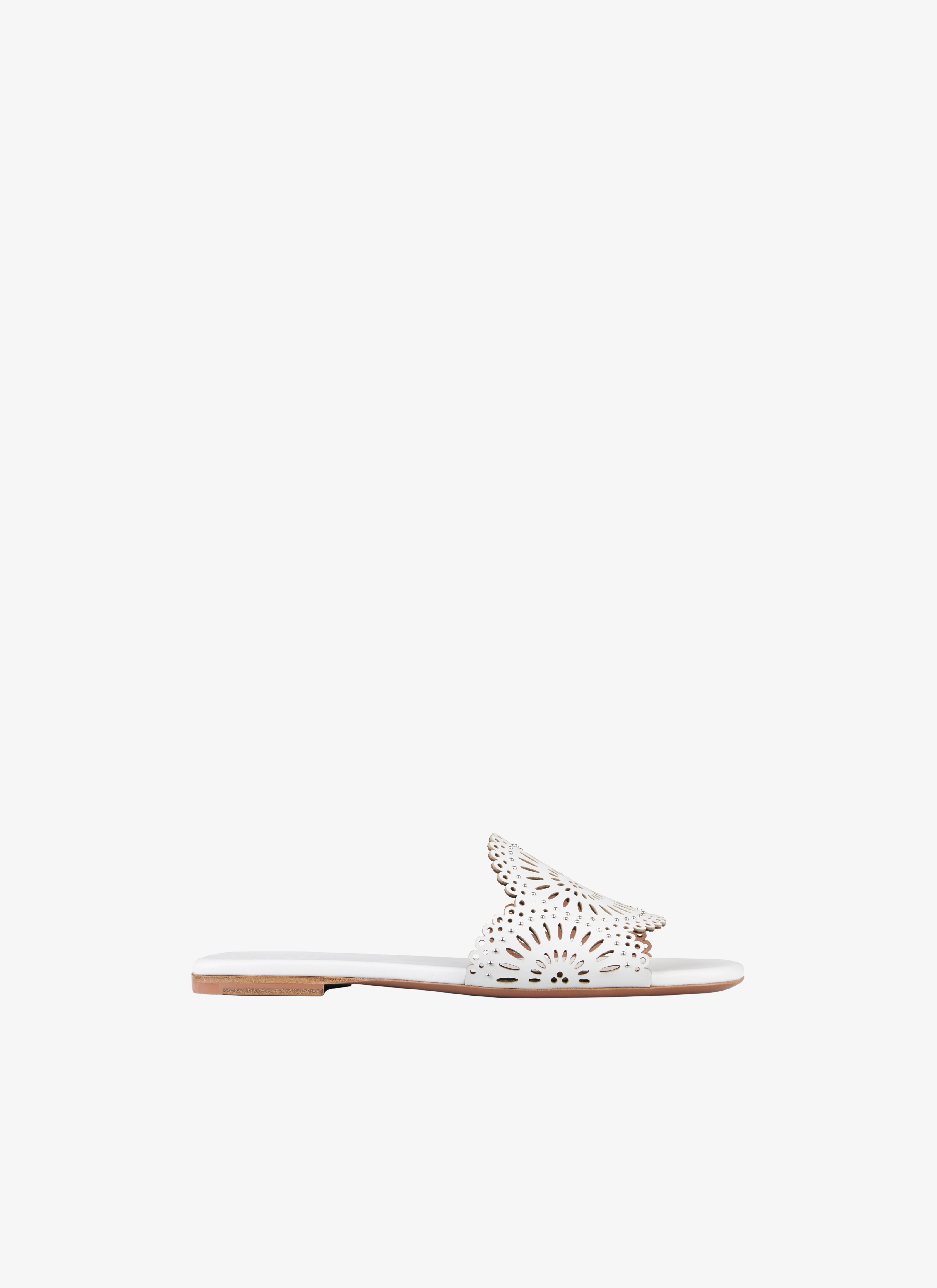 ALAÏA WHITE LEATHER FLAT MULES