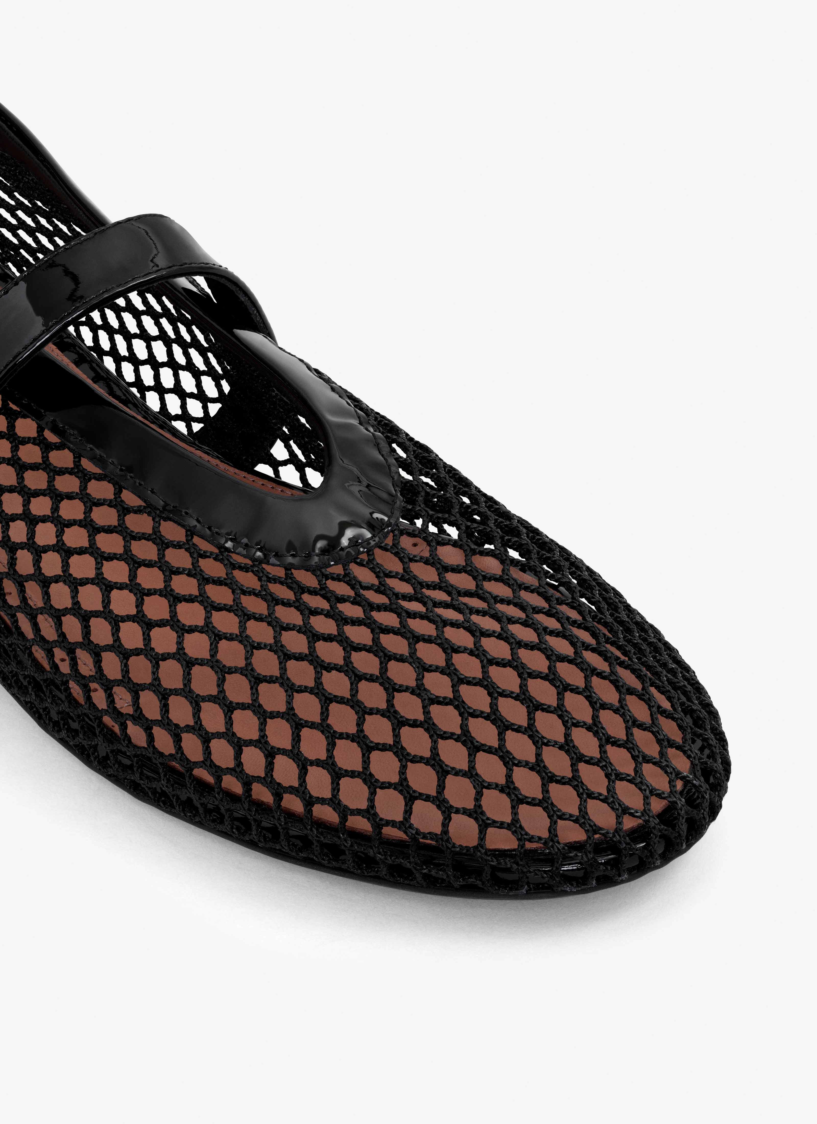 ALAÏA BLACK BALLET FLATS IN FISHNET