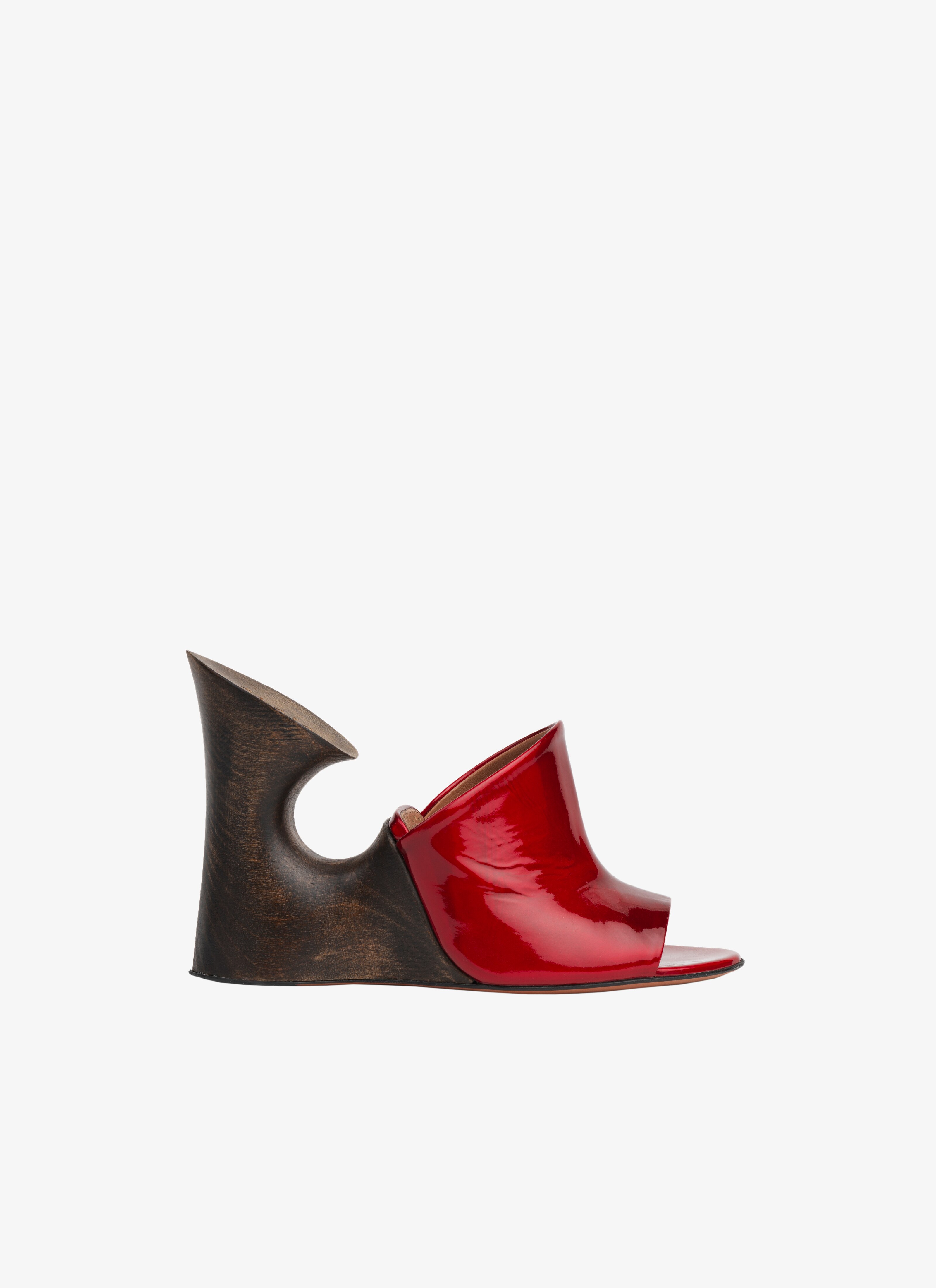 WOODEN HEEL SCULPTURE maison-alaia.com