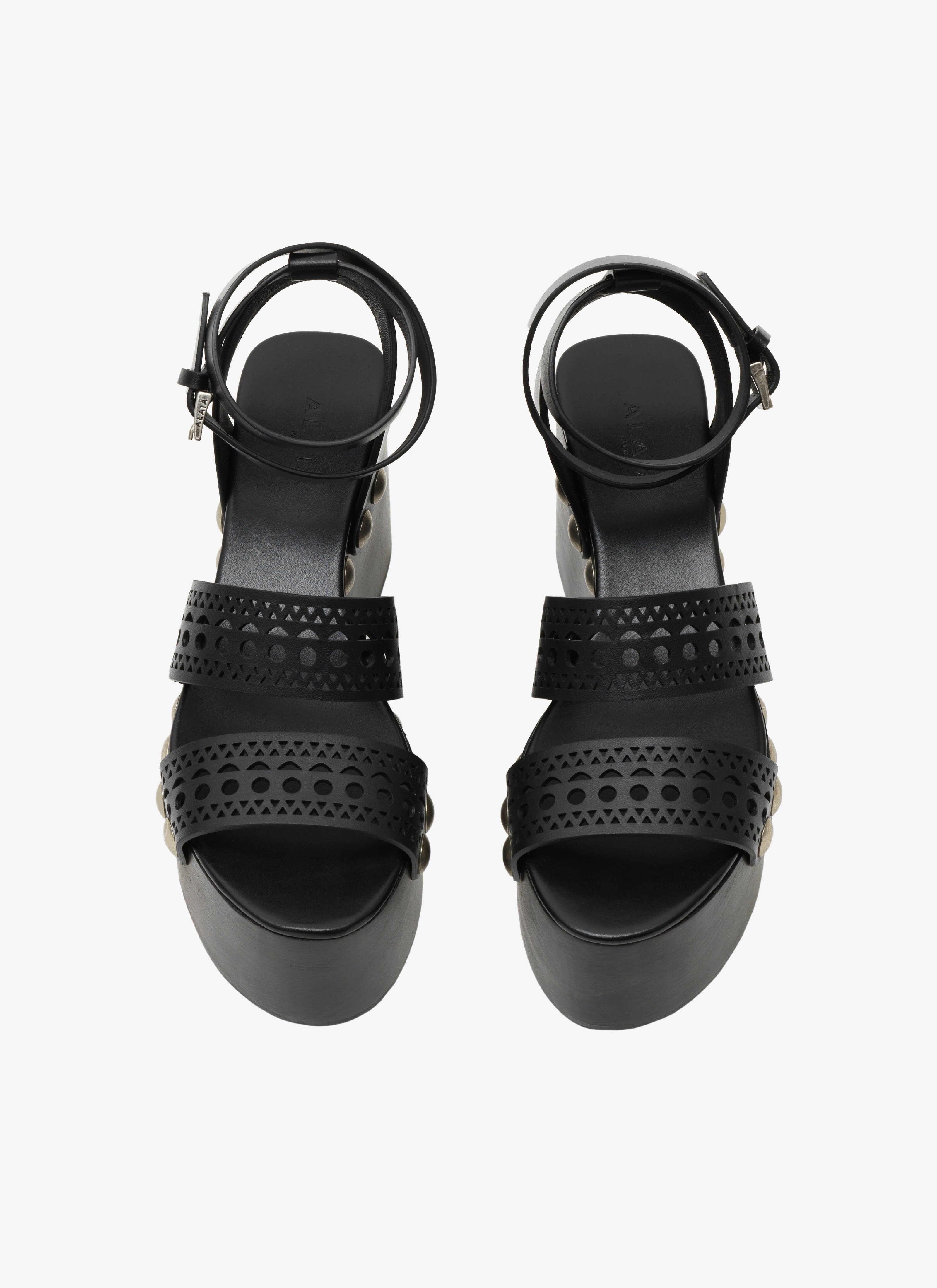 ALAÏA SANDALES À TALON EN BOIS EN CUIR AJOURÉ NOIR