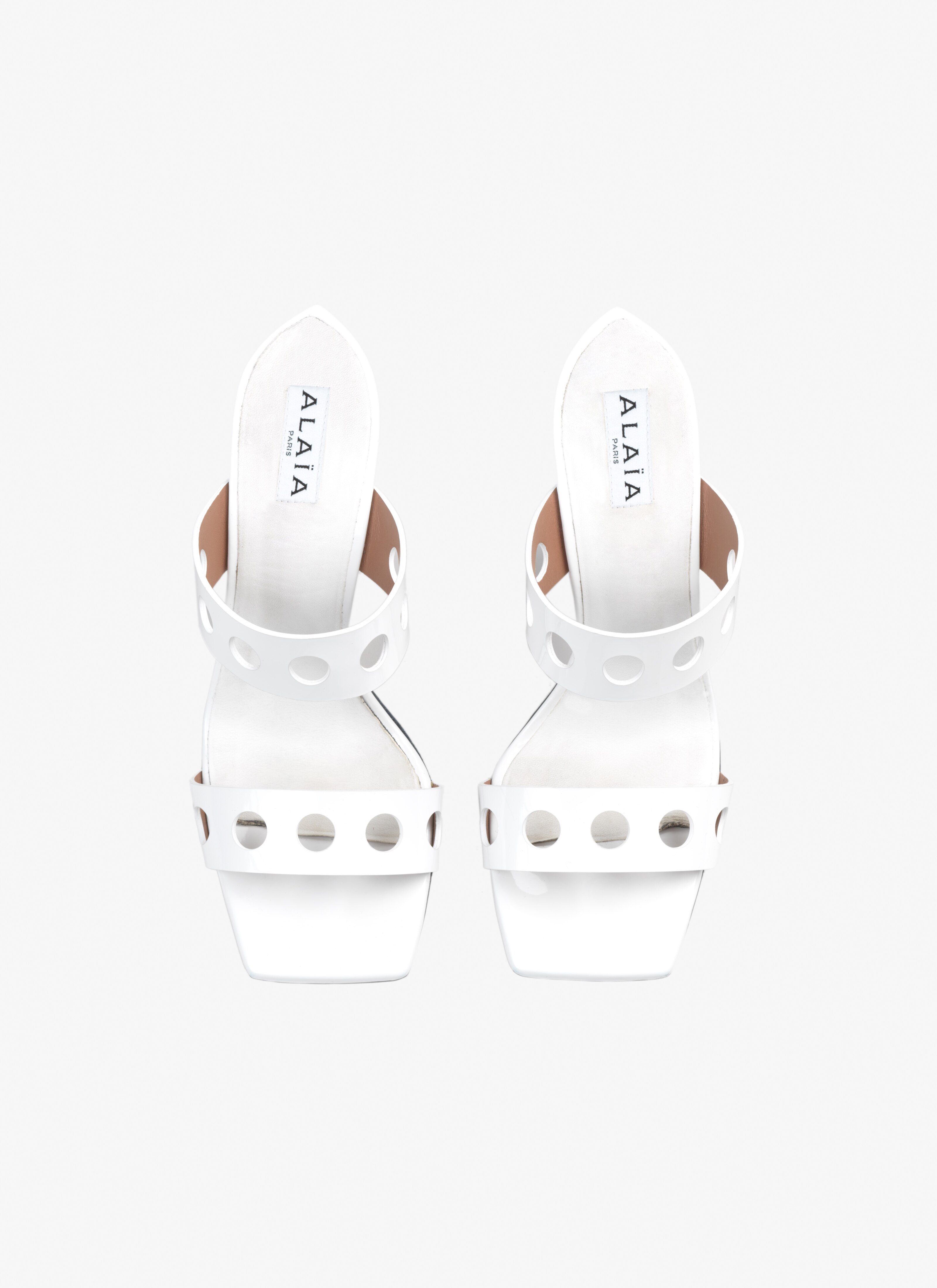 Perforated sandals in patent calfskin - maison-alaia.com