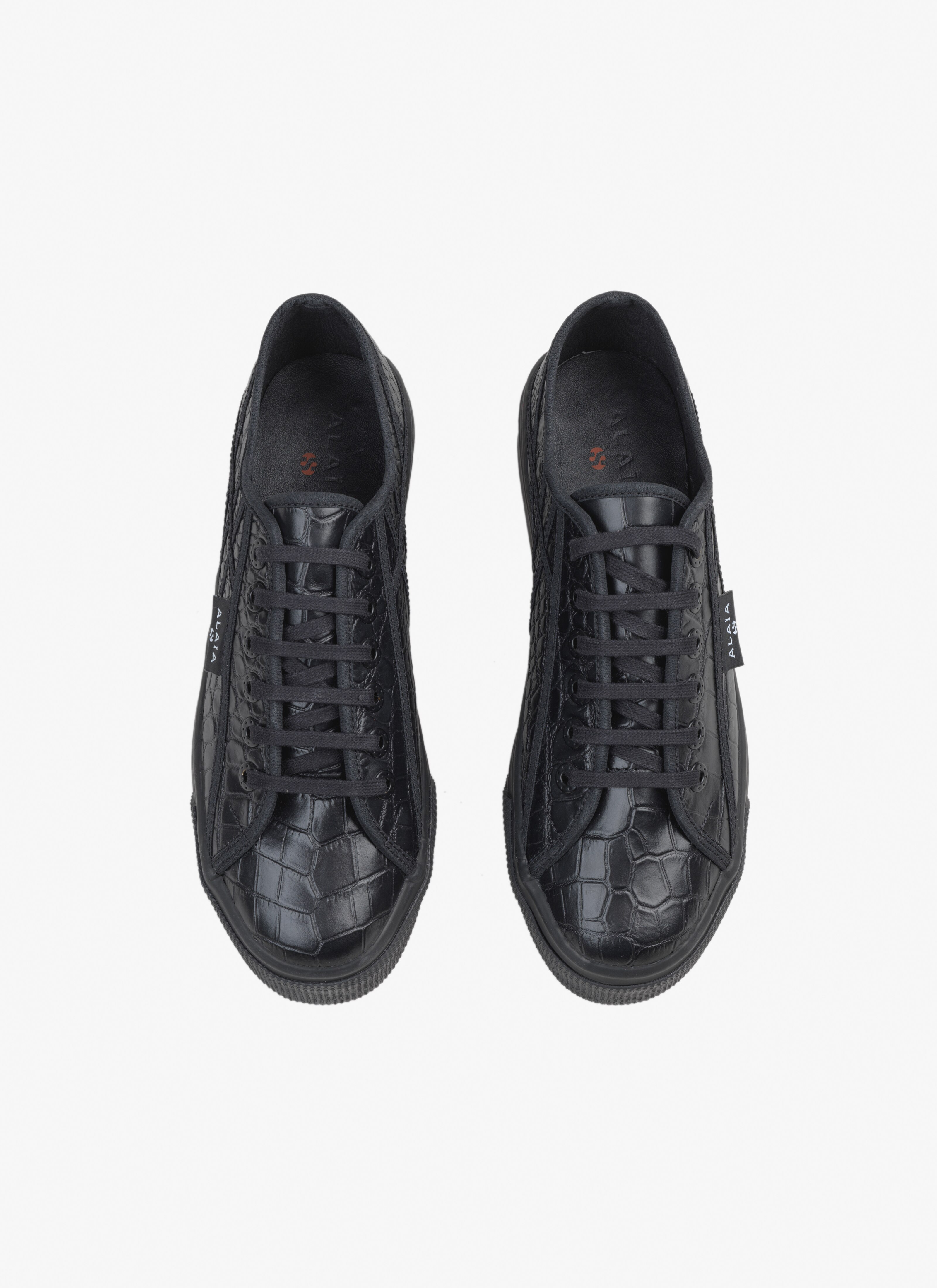 ALAÏA BLACK SUPERGA PLATFORM SNEAKERS IN CALFSKIN
