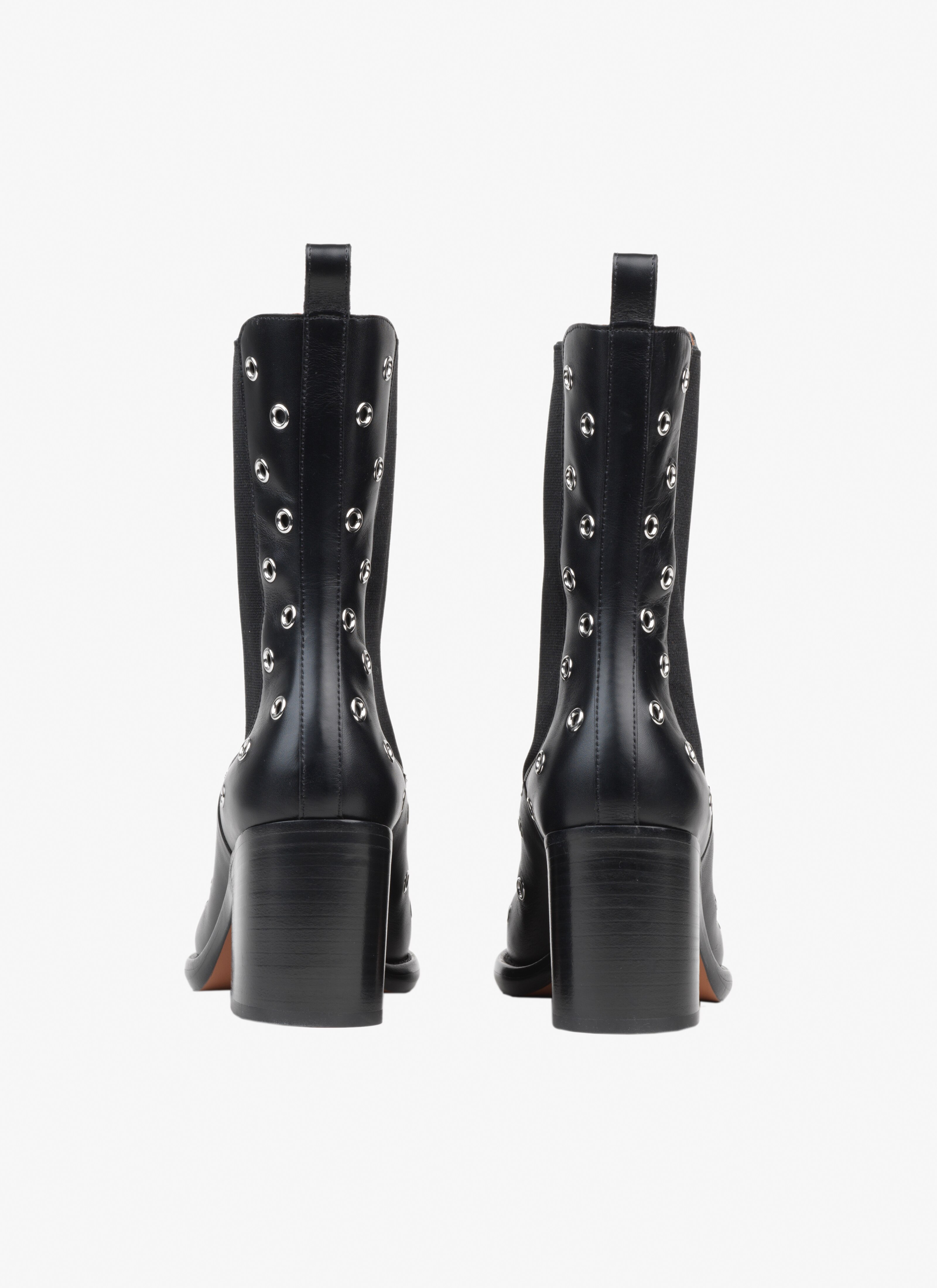 Round heeled boots
 - maison-alaia.com