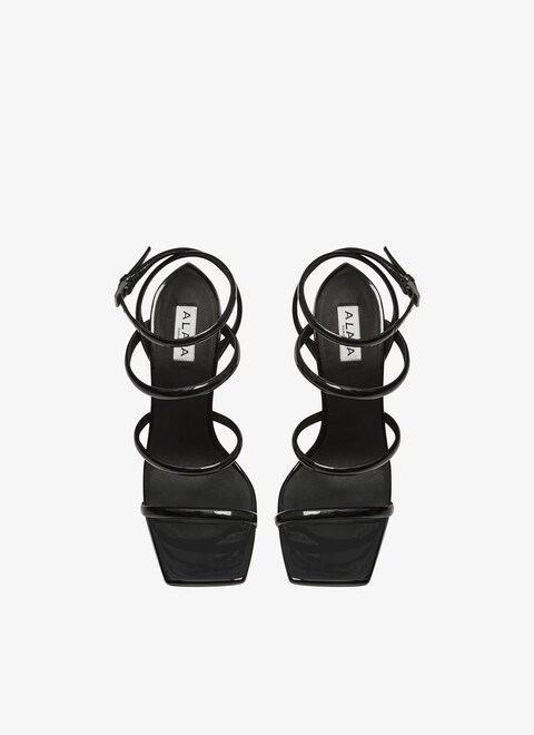 Perforated sandals in patent calfskin - maison-alaia.com