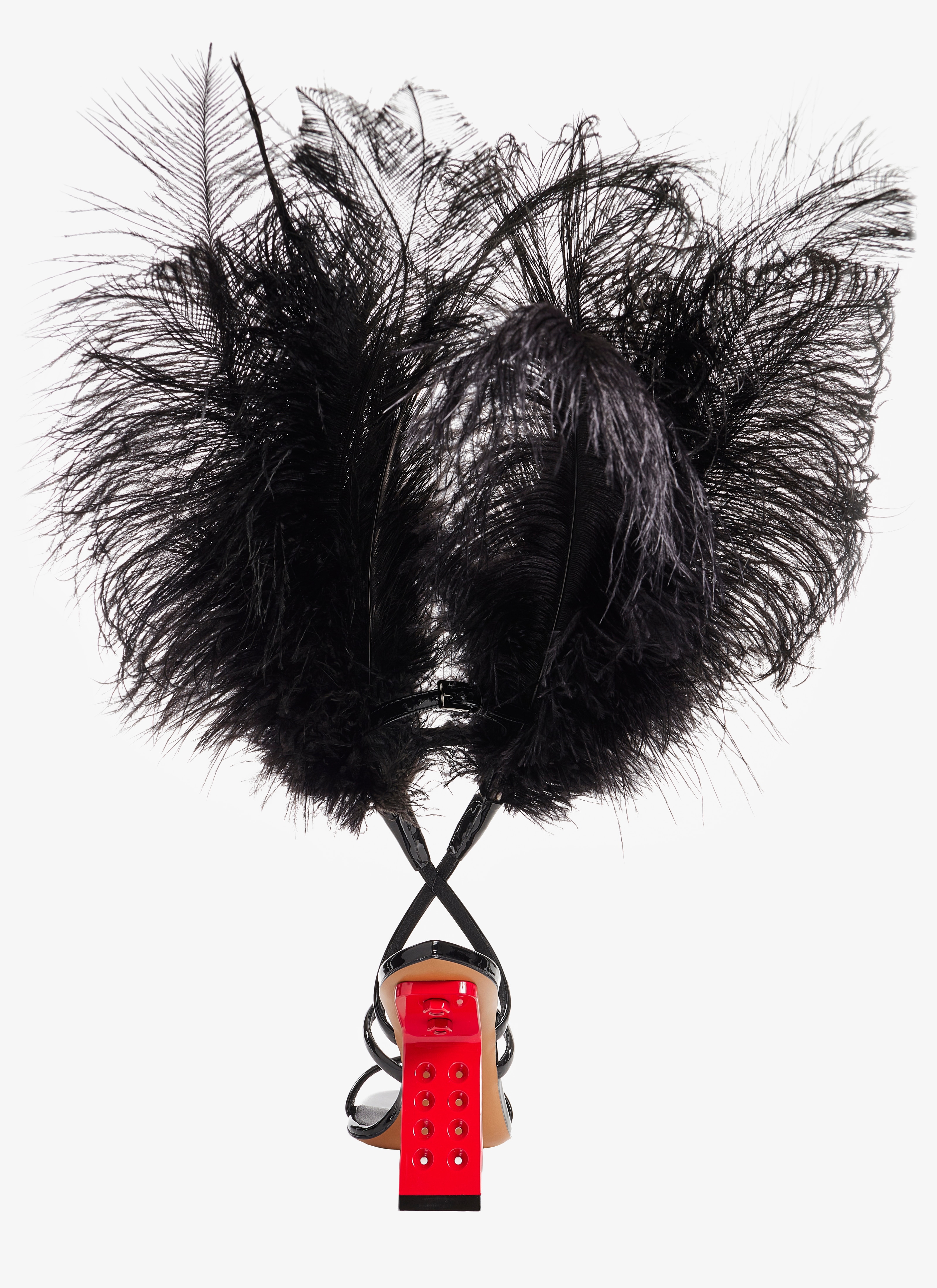 ALAÏA  FEATHER PERFORATED SANDALS IN PATENT CALFSKIN