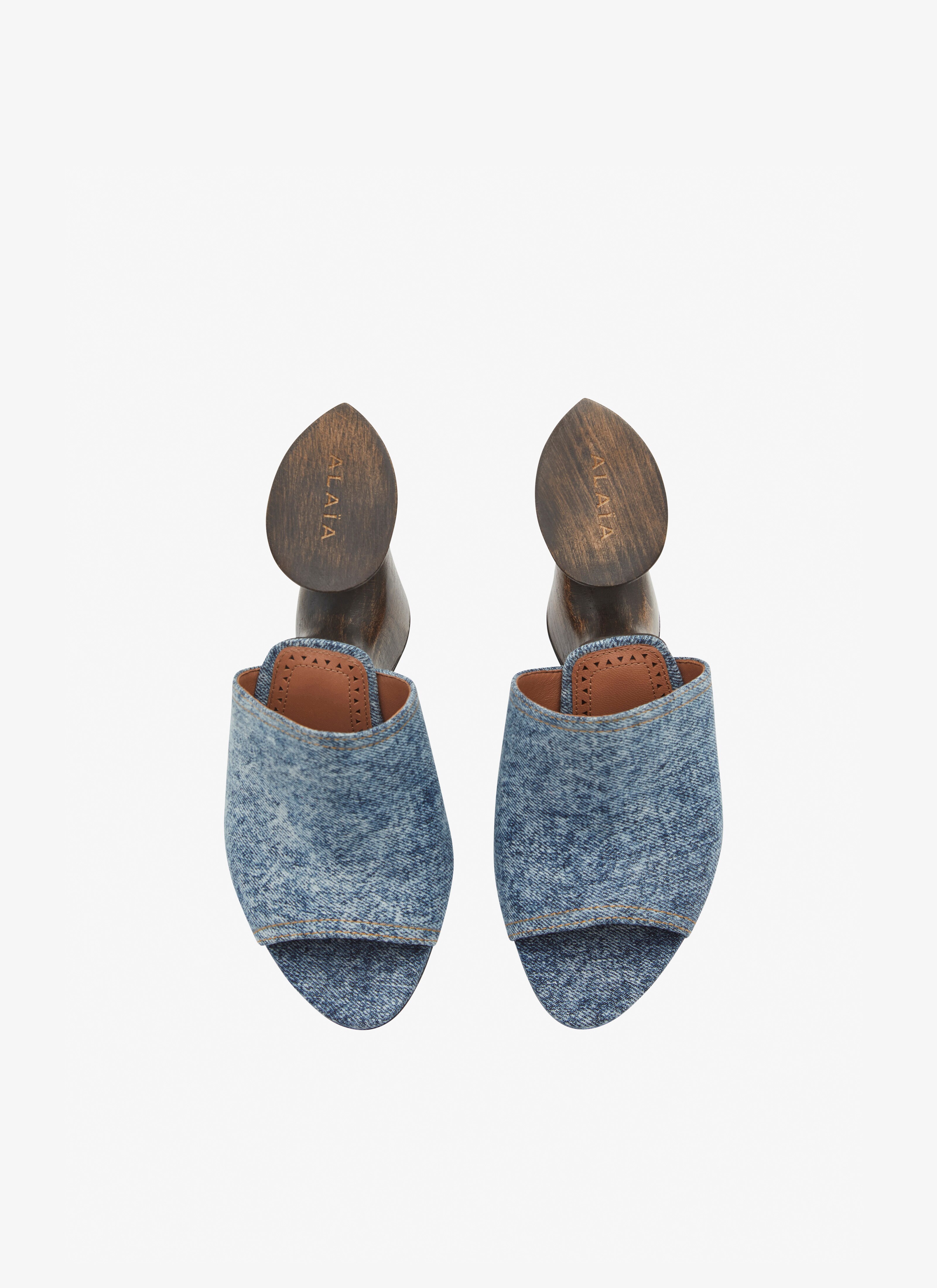 La Sculpture mules in denim and wood - maison-alaia.com