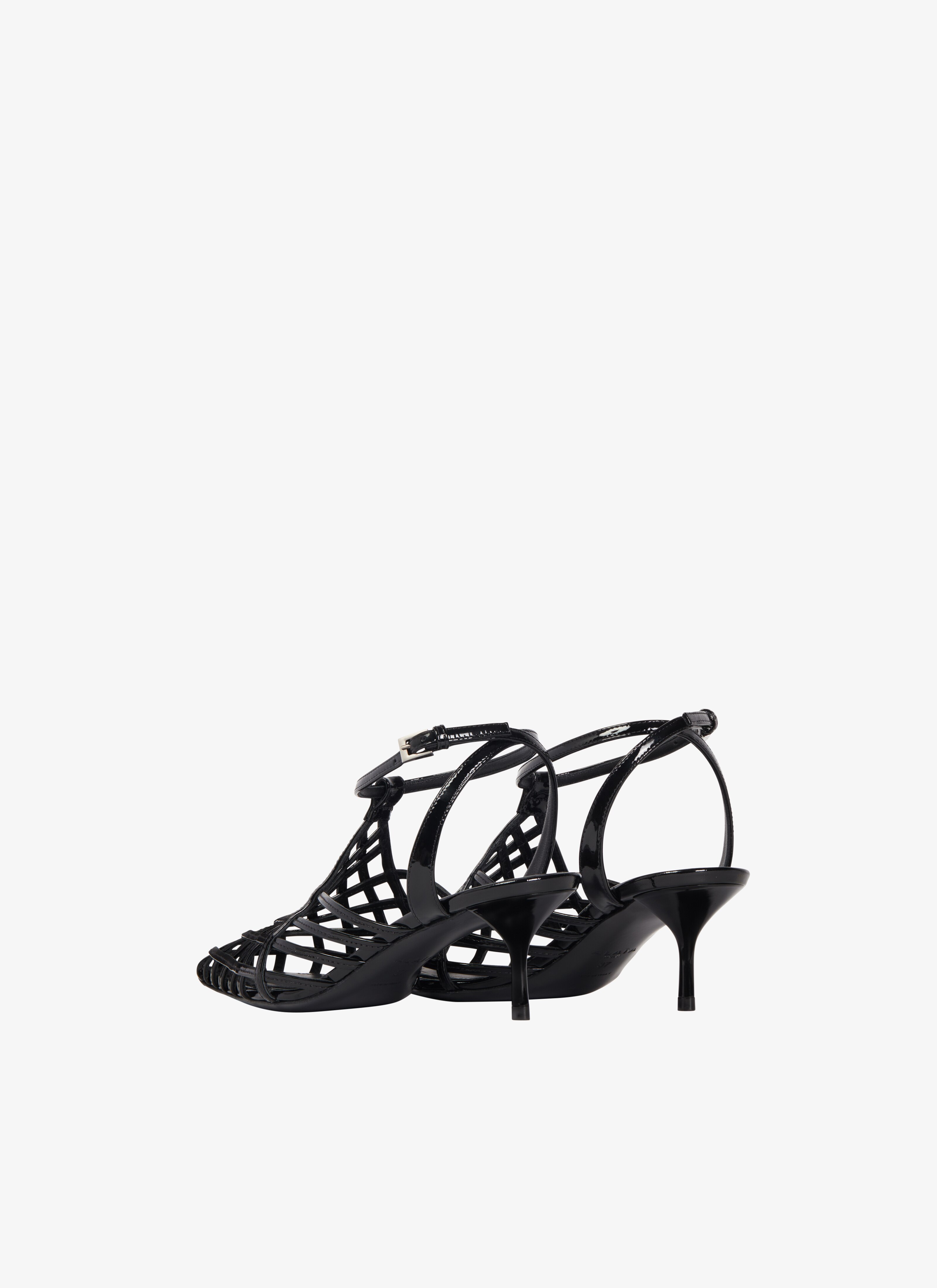 ALAÏA BLACK LA CAGE SANDALS IN PATENT CALFSKIN 