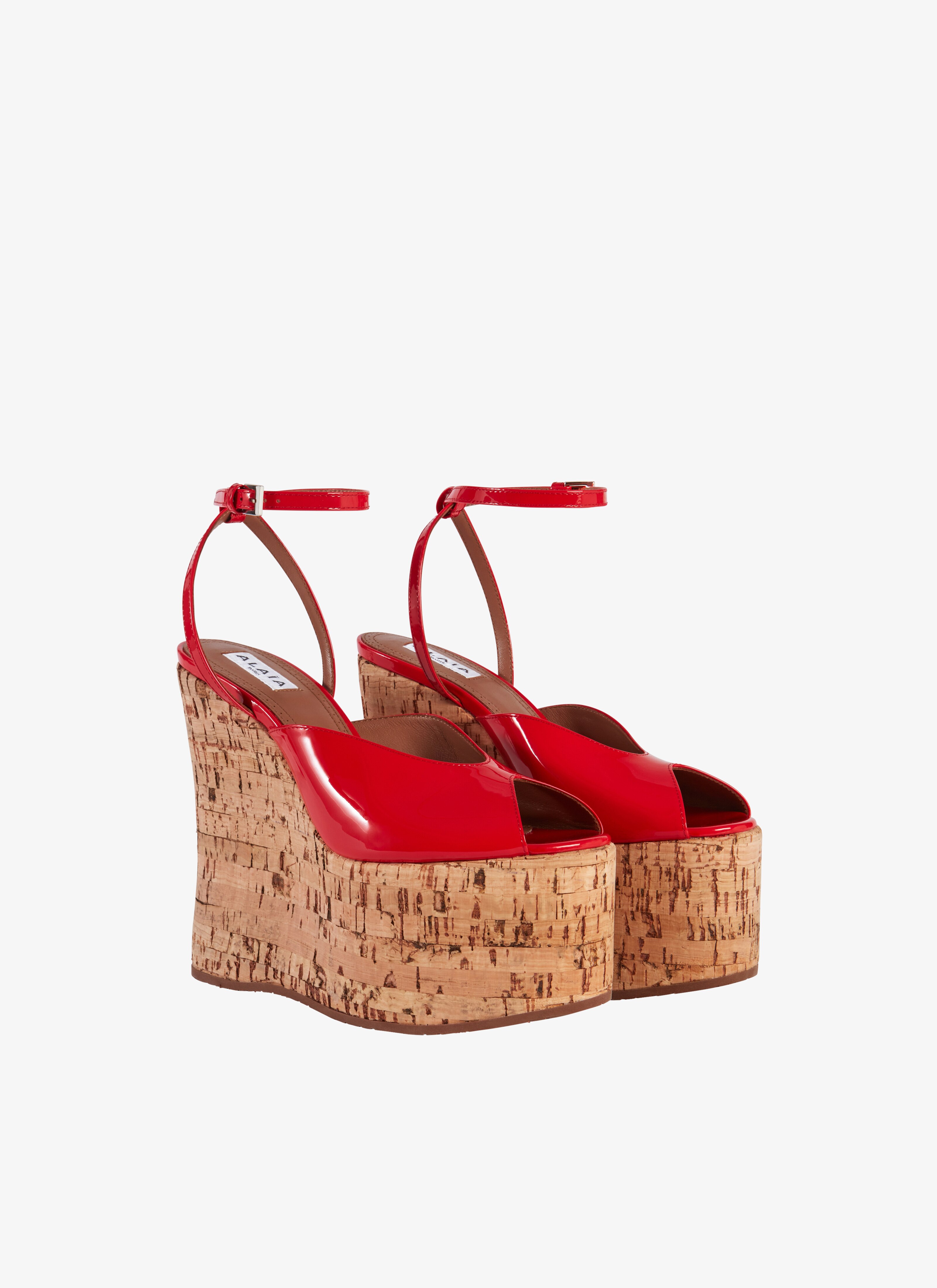 ALAÏA RED WEDGE PEEP TOE SANDALS IN PATENT LAMBSKIN