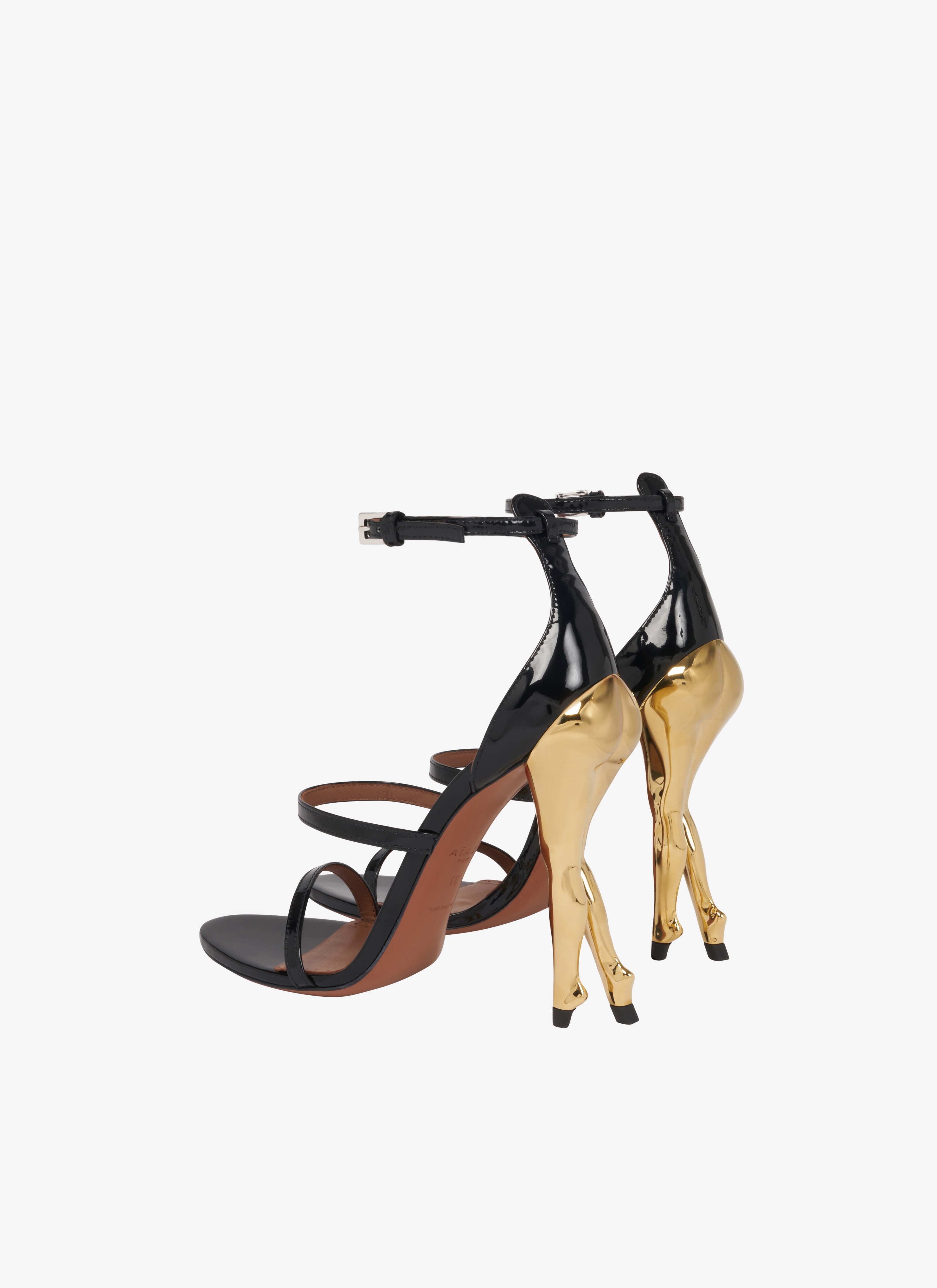 ALAÏA GOLD CABARET SANDALS IN PATENT CALFSKIN