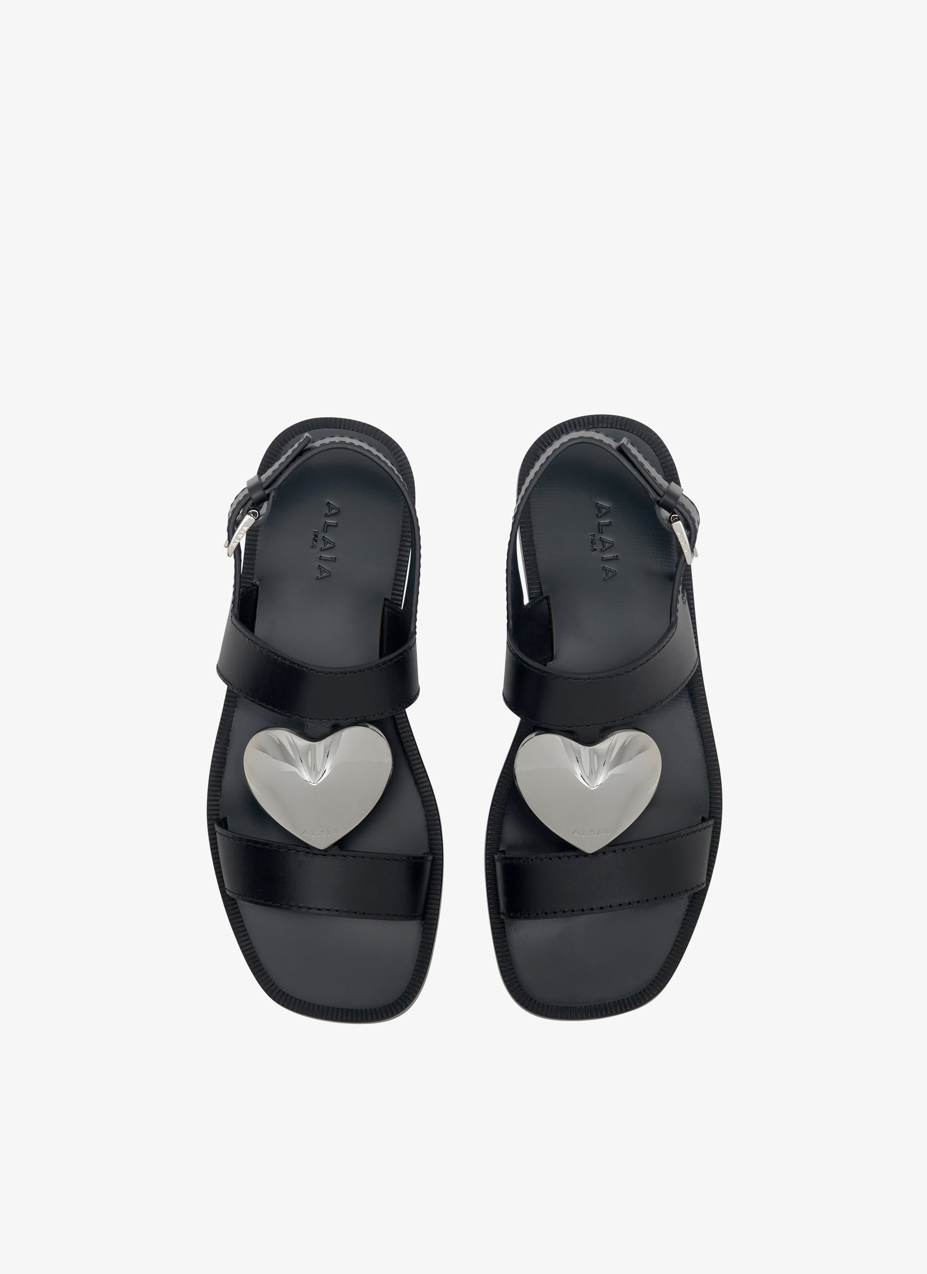 ALAÏA BLACK FLAT SANDALS LE CŒUR IN LAMBSKIN