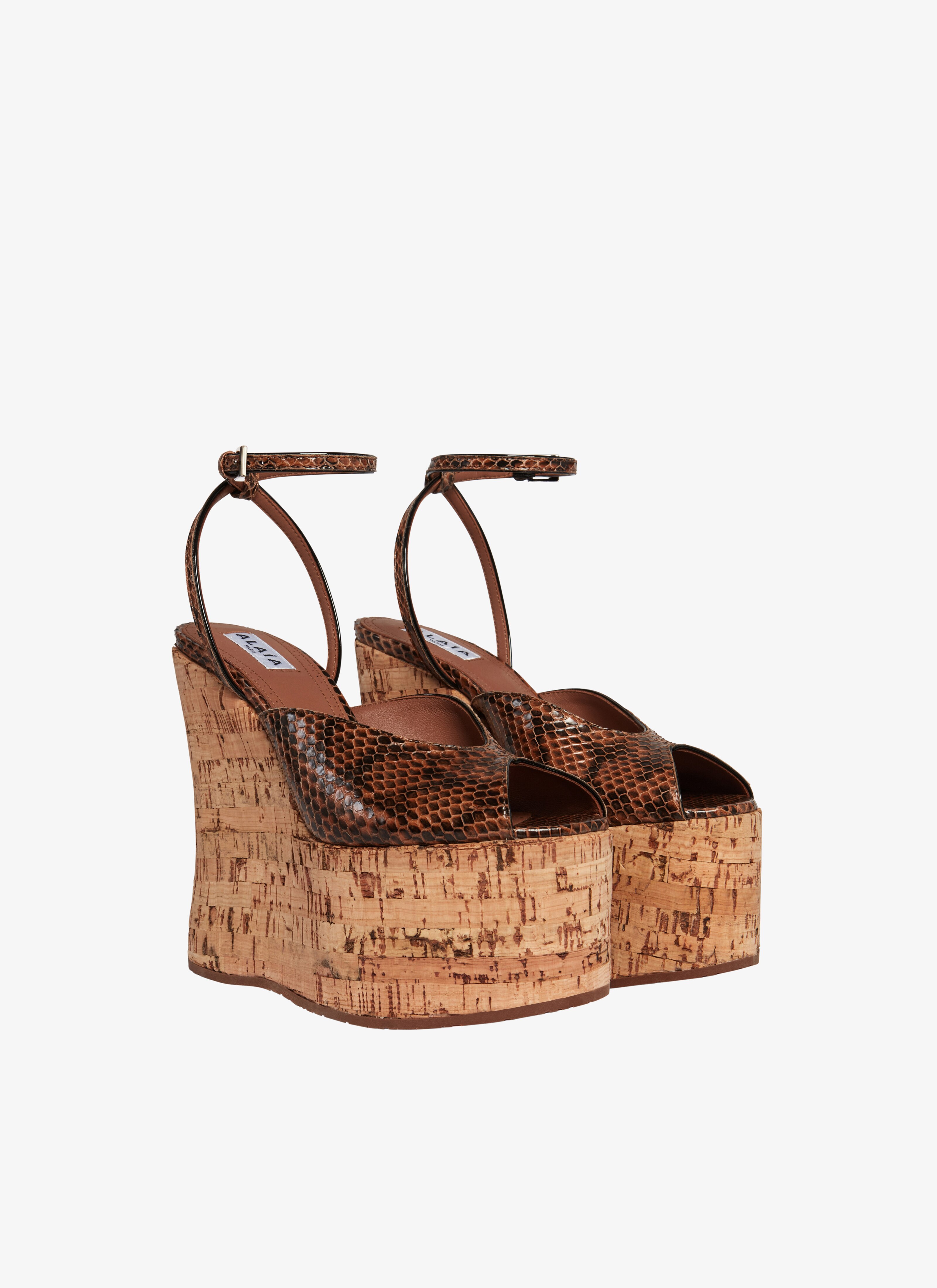 ALAÏA  WEDGE PEEP TOE SANDALS IN ELAPHE