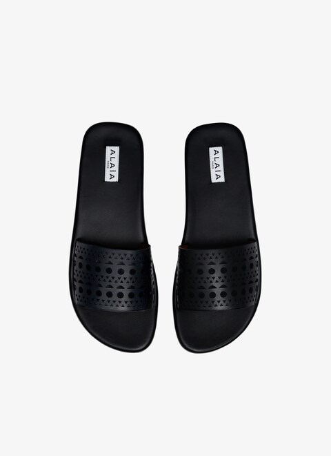 MULES IN VIENNE CALFSKIN
 - maison-alaia.com