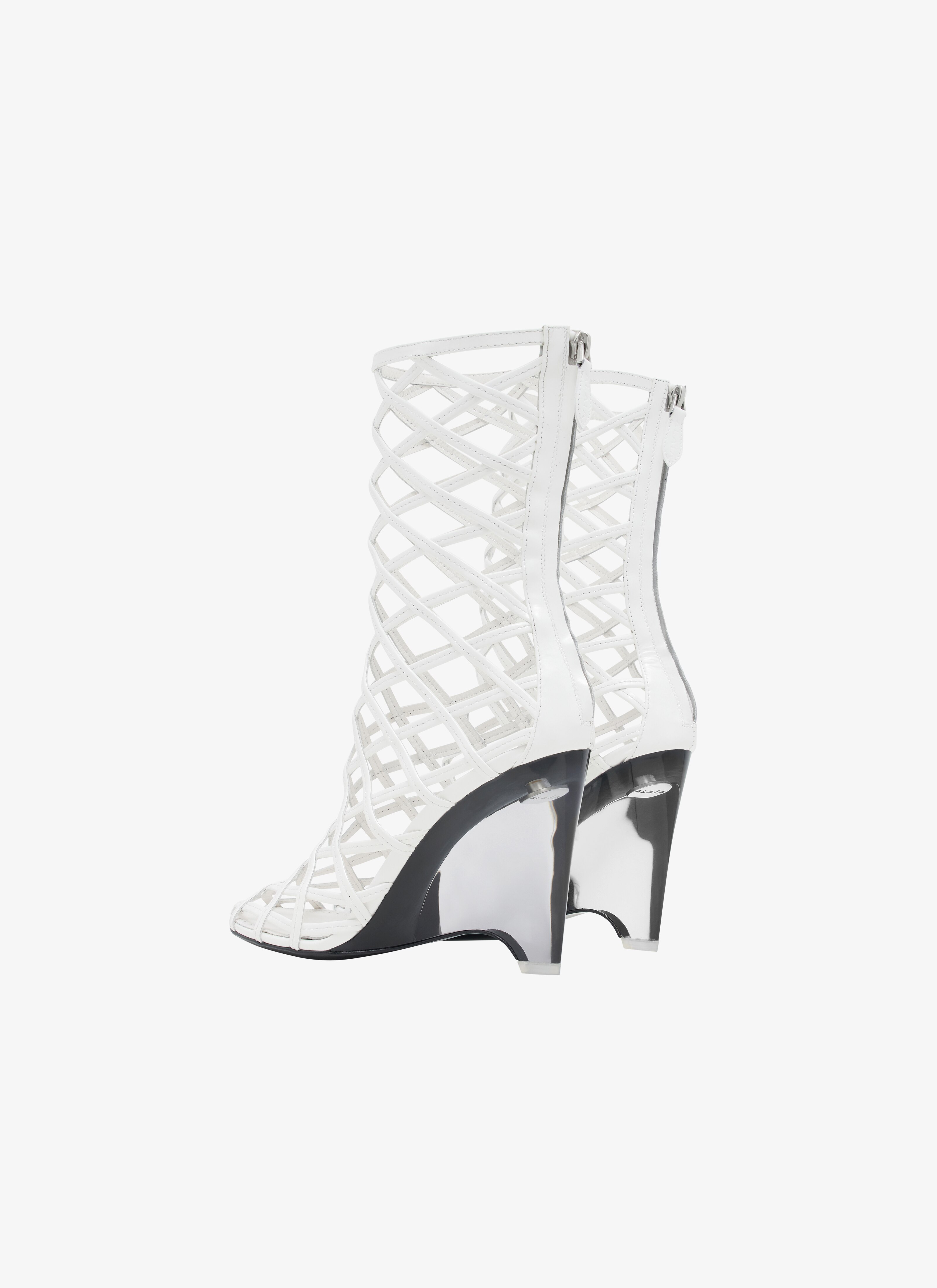 ALAÏA WHITE LA CAGE WEDGE BOOTIES IN LAMBSKIN