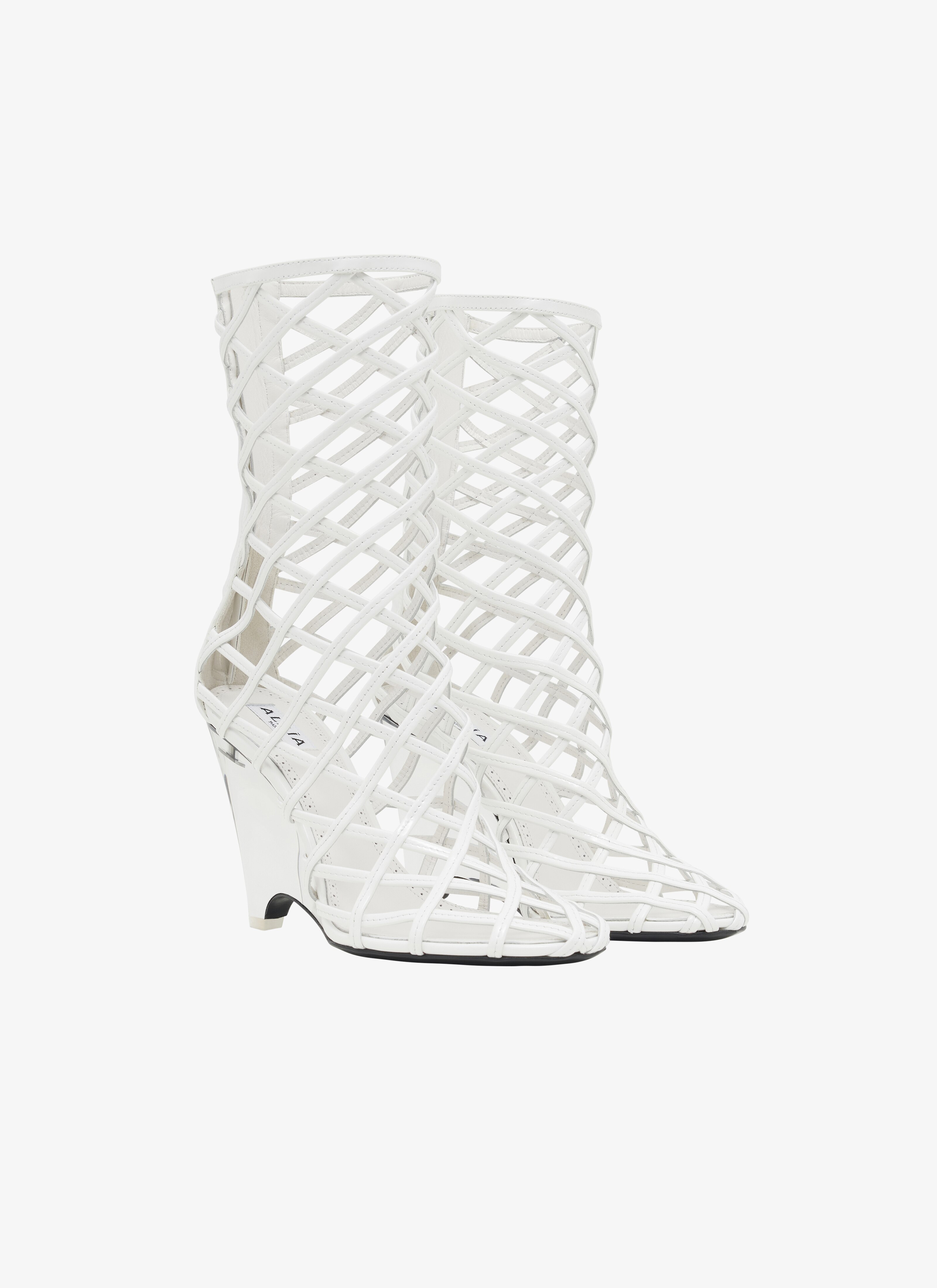 ALAÏA WHITE LA CAGE WEDGE BOOTIES IN LAMBSKIN