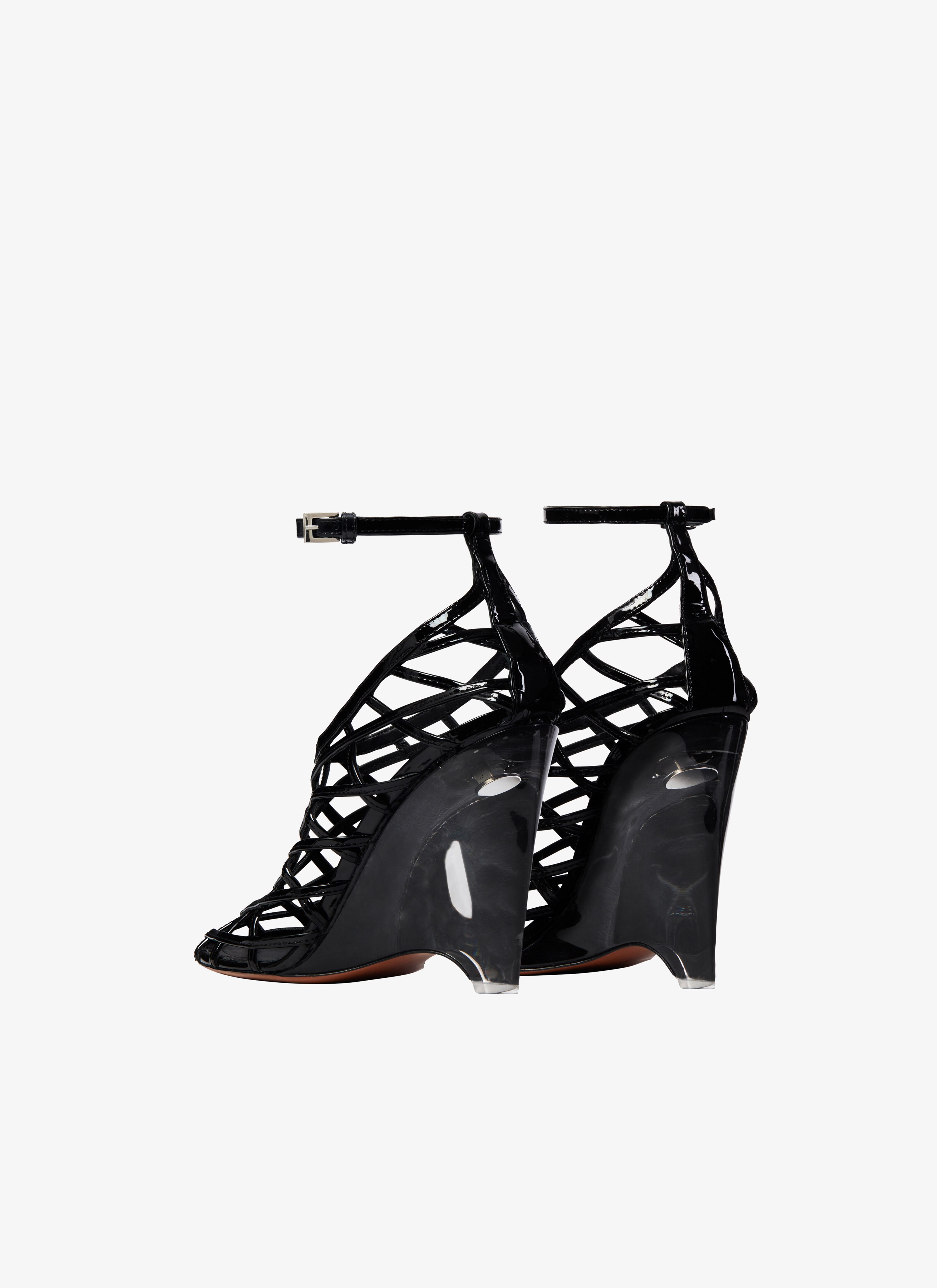 ALAÏA BLACK LA CAGE WEDGE PUMPS IN PATENT LAMBSKIN