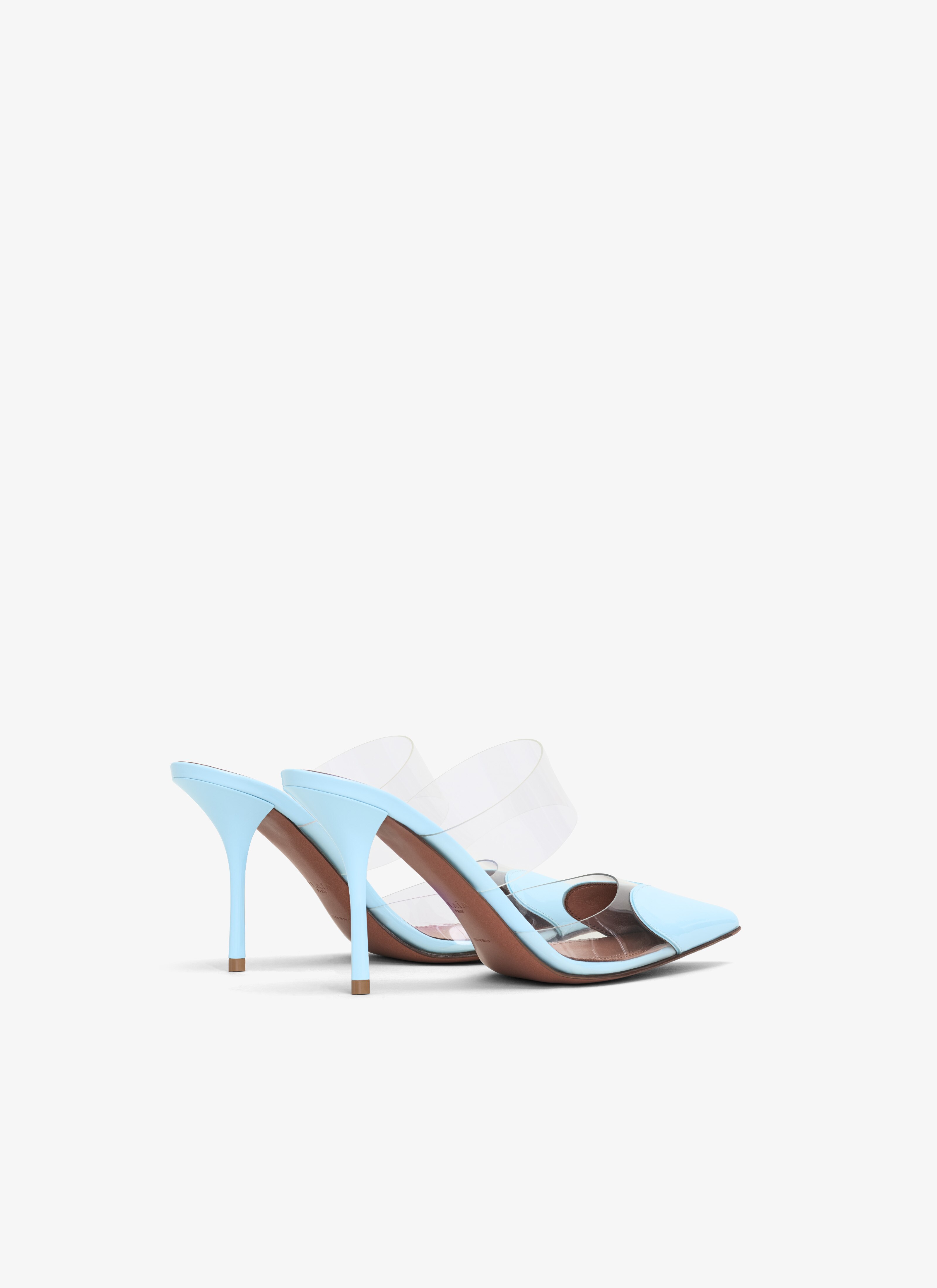 ALAÏA BLUE LE CŒUR MULES IN PATENT CALFSKIN
