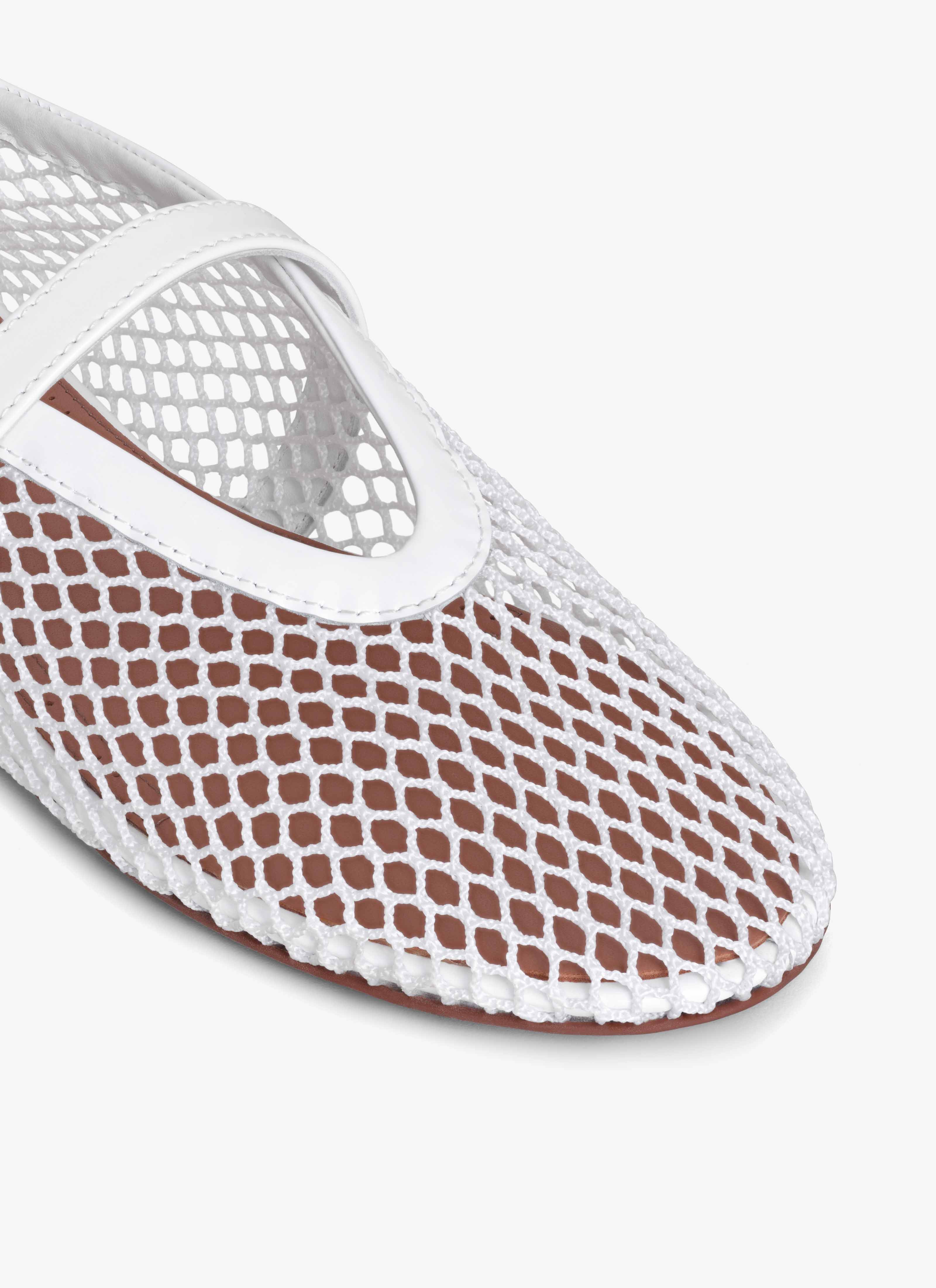 ALAÏA WHITE BALLET FLATS IN FISHNET