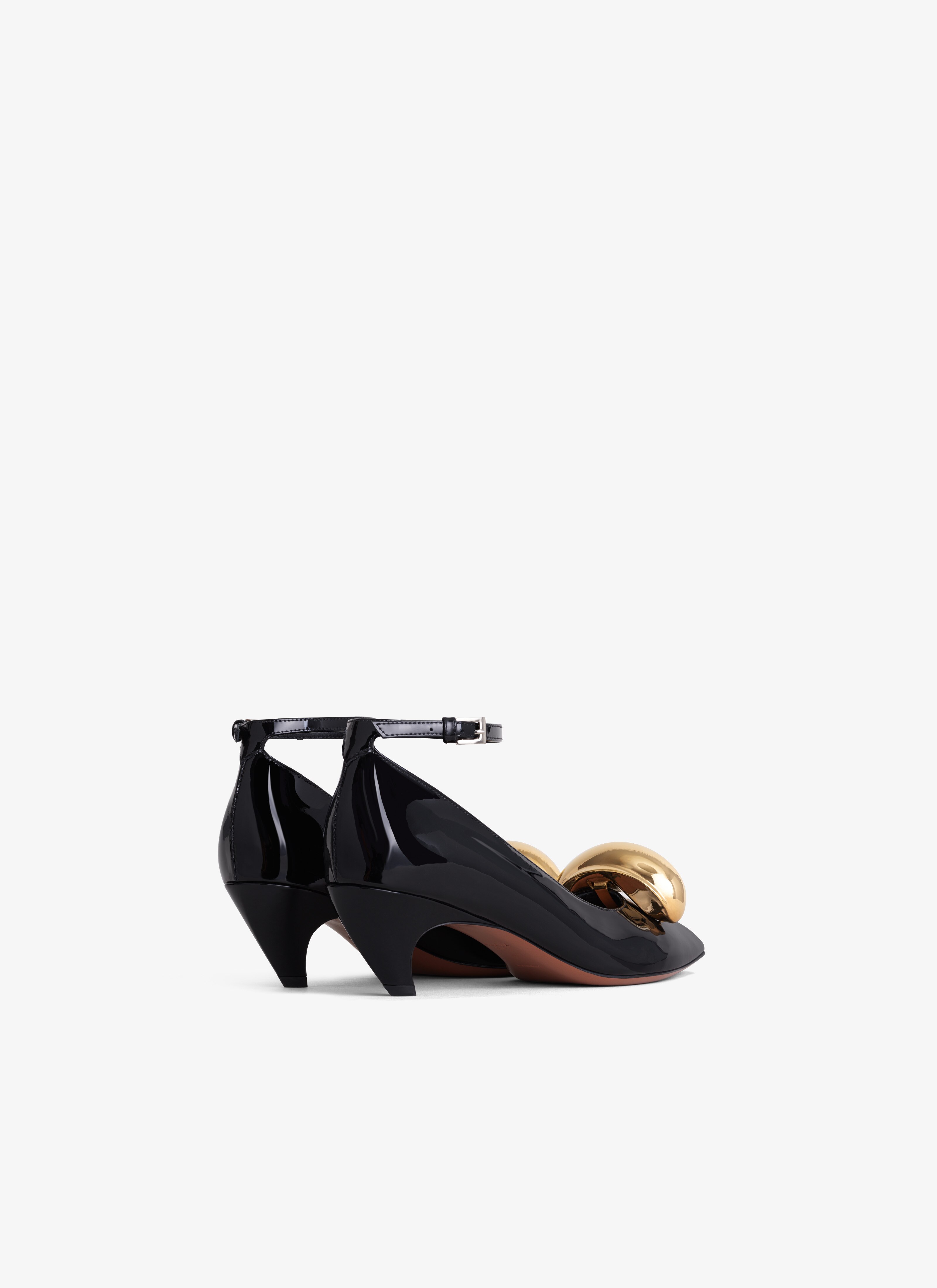 ALAÏA BLACK SHARK JEWEL PUMPS IN CALFSKIN
