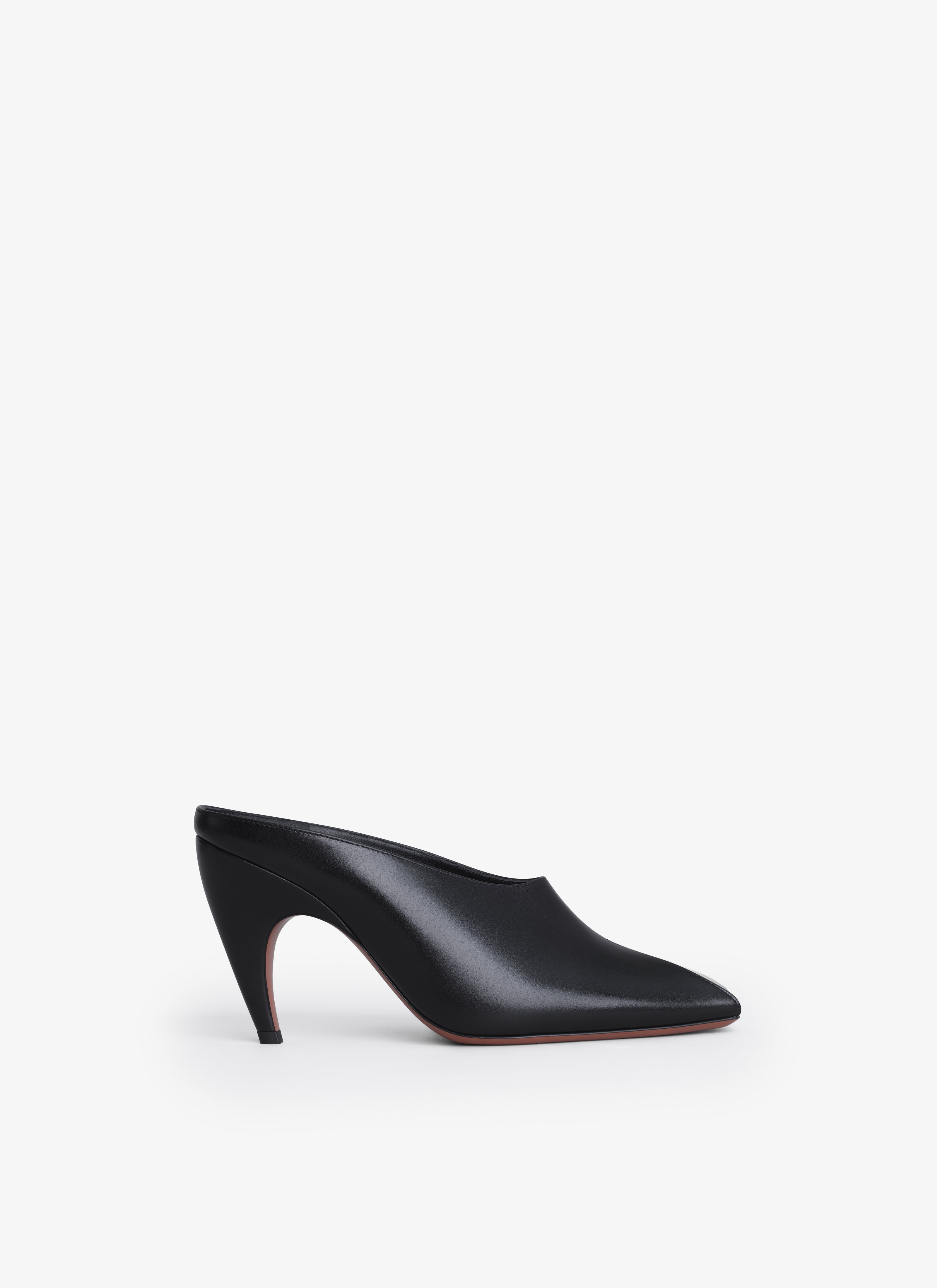 ALAÏA BLACK SPIKE MULES IN CALFSKIN
