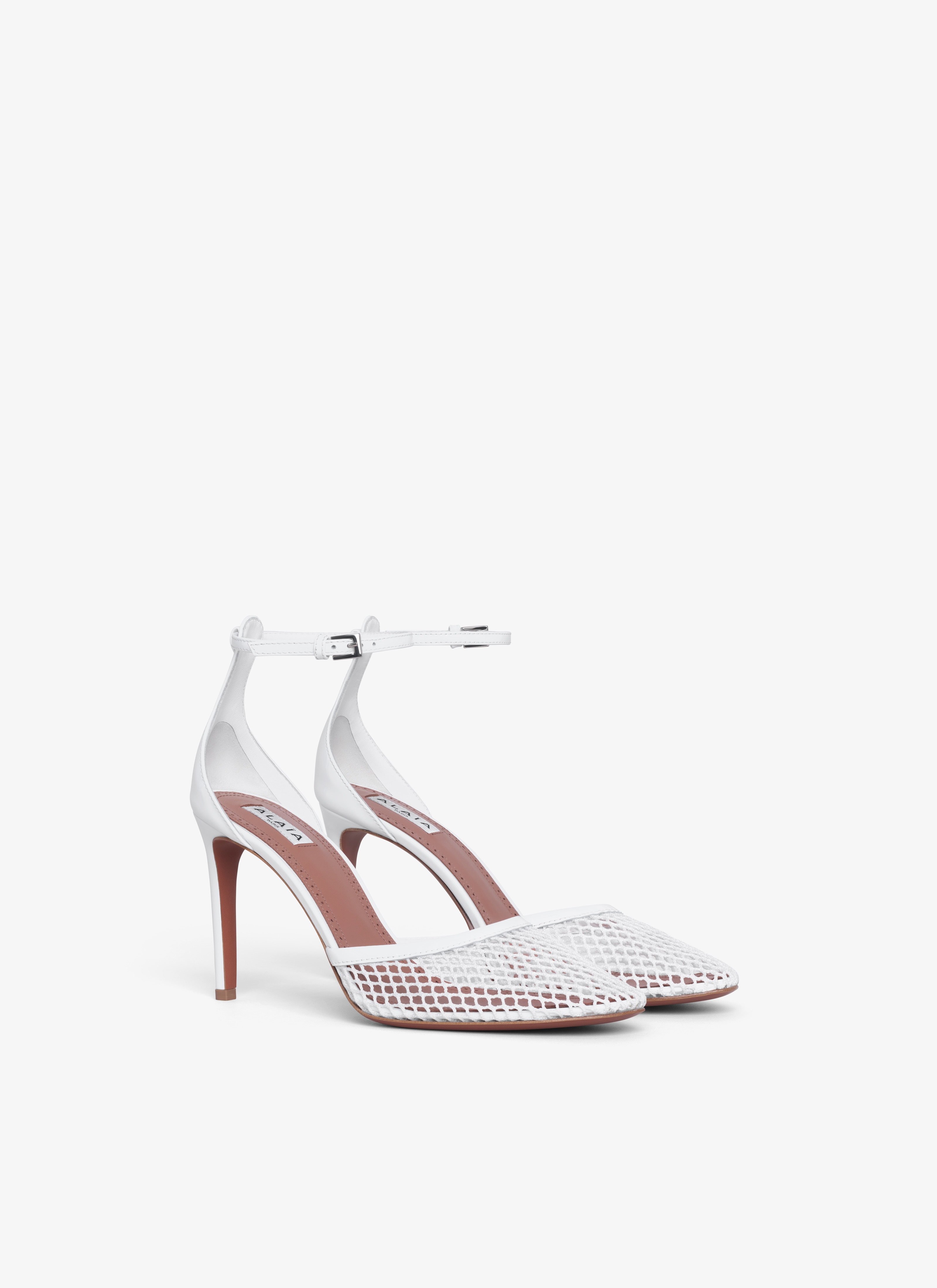 ALAÏA WHITE HIGH FISHNET PUMPS