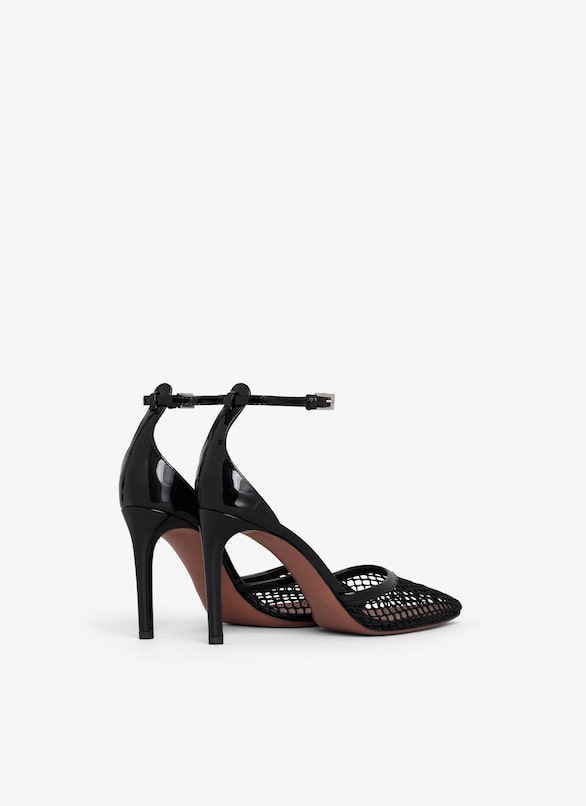 HIGH FISHNET PUMPS ALAÏA BLACK HIGH FISHNET PUMPS
