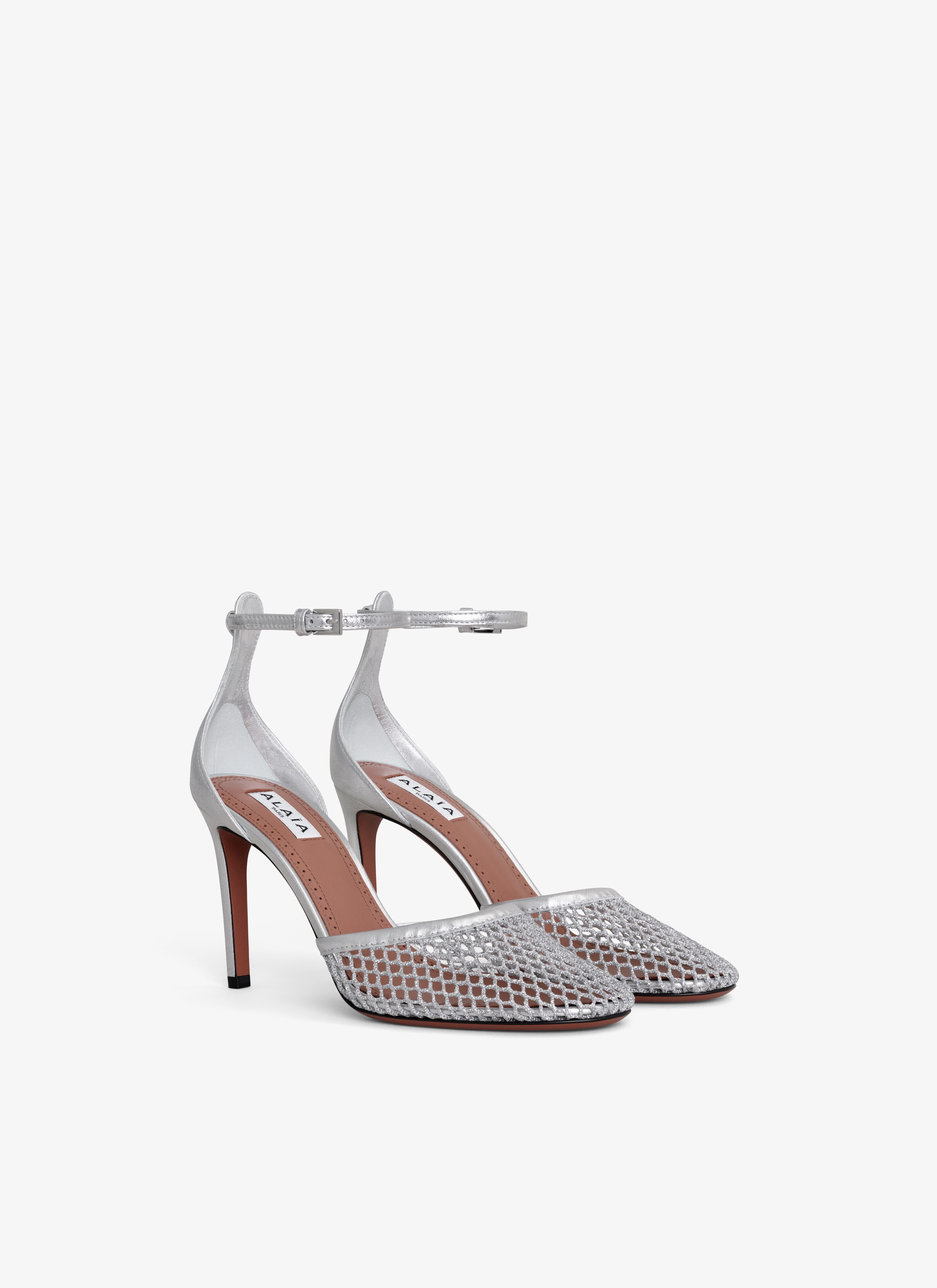 ALAÏA SILVER HIGH FISHNET PUMPS