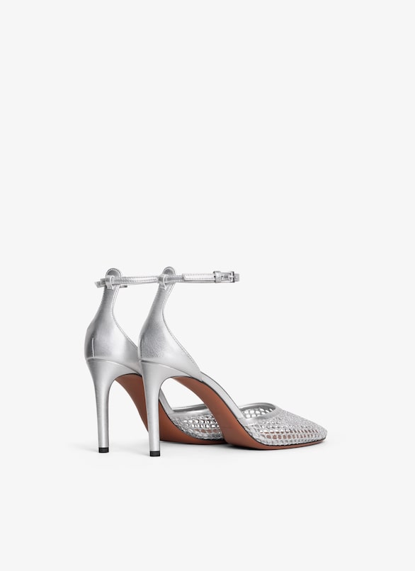 HIGH FISHNET PUMPS ALAÏA SILVER HIGH FISHNET PUMPS