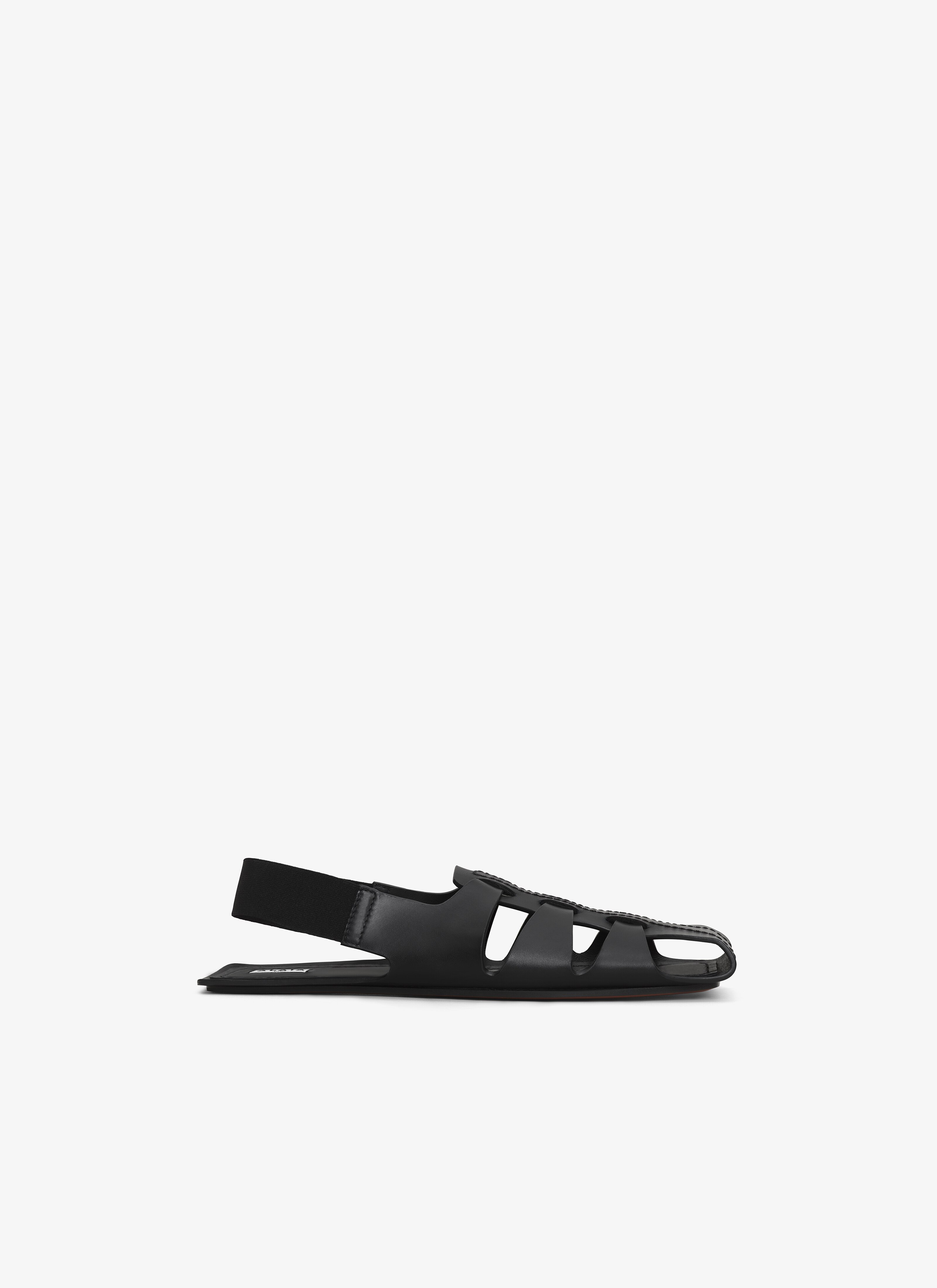 ALAÏA BLACK FOLDED FLAT SANDALS IN CALFSKIN