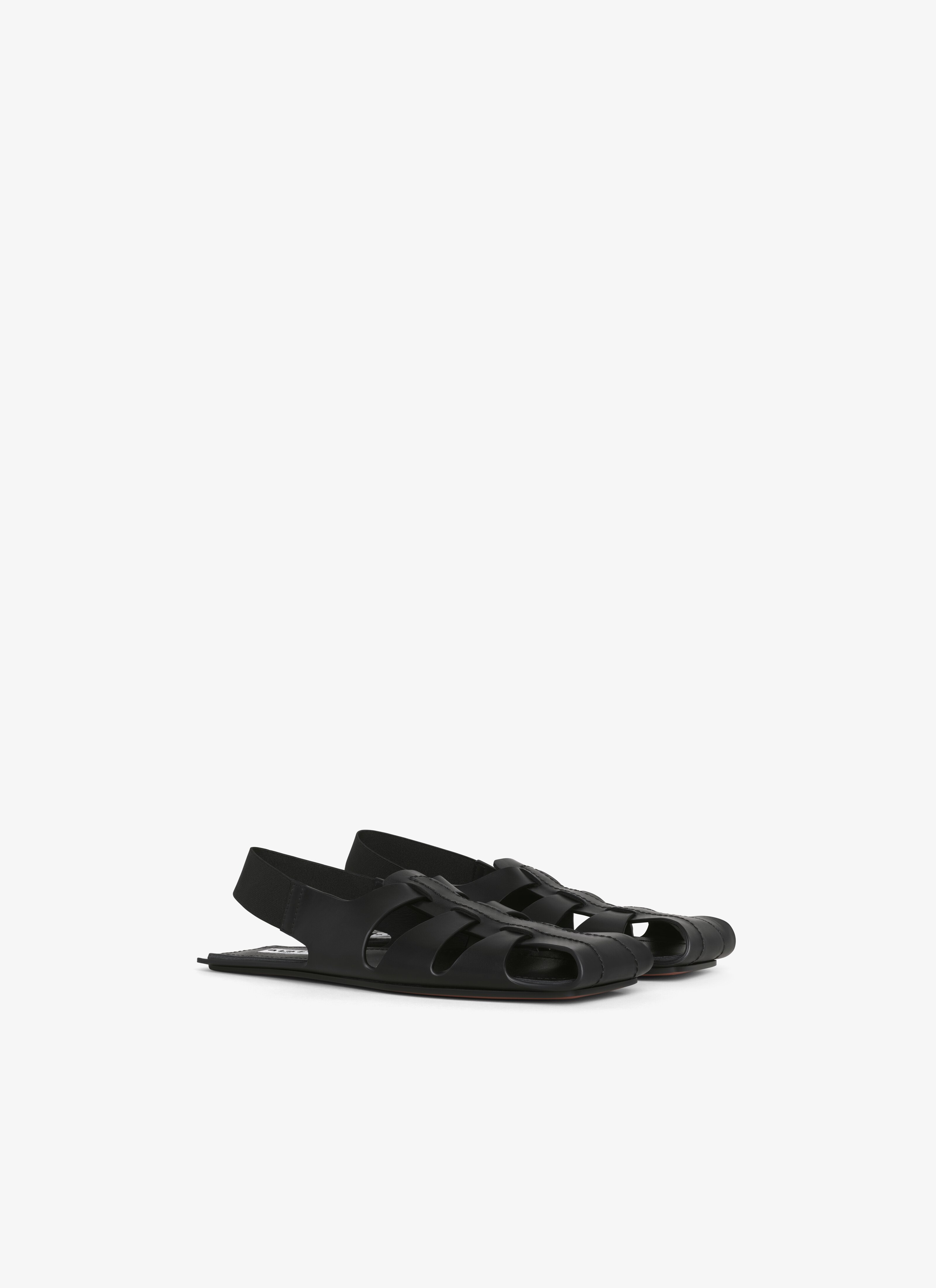 ALAÏA BLACK FOLDED FLAT SANDALS IN CALFSKIN
