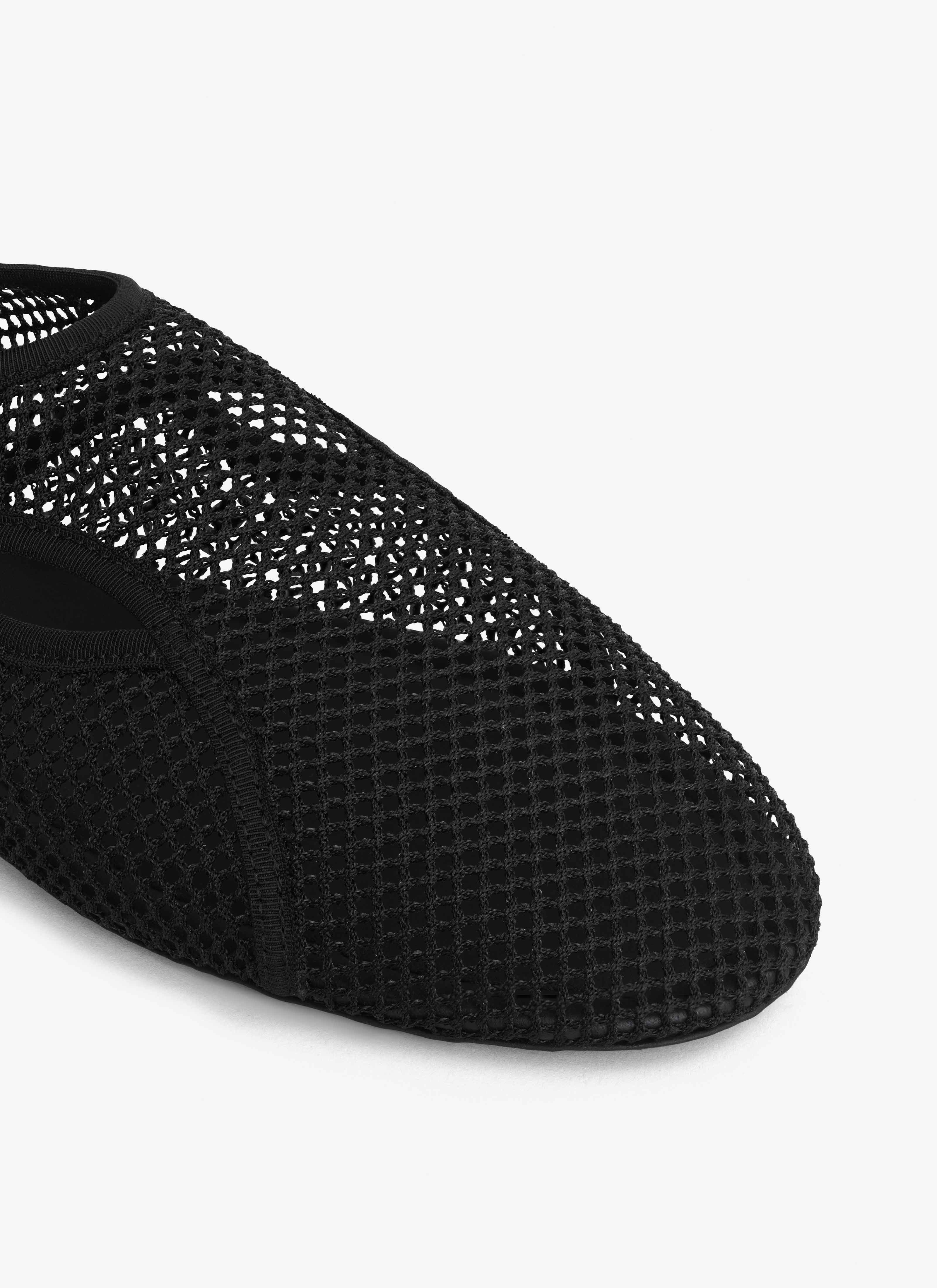 ALAÏA BLACK SLIPPERS IN FISHNET