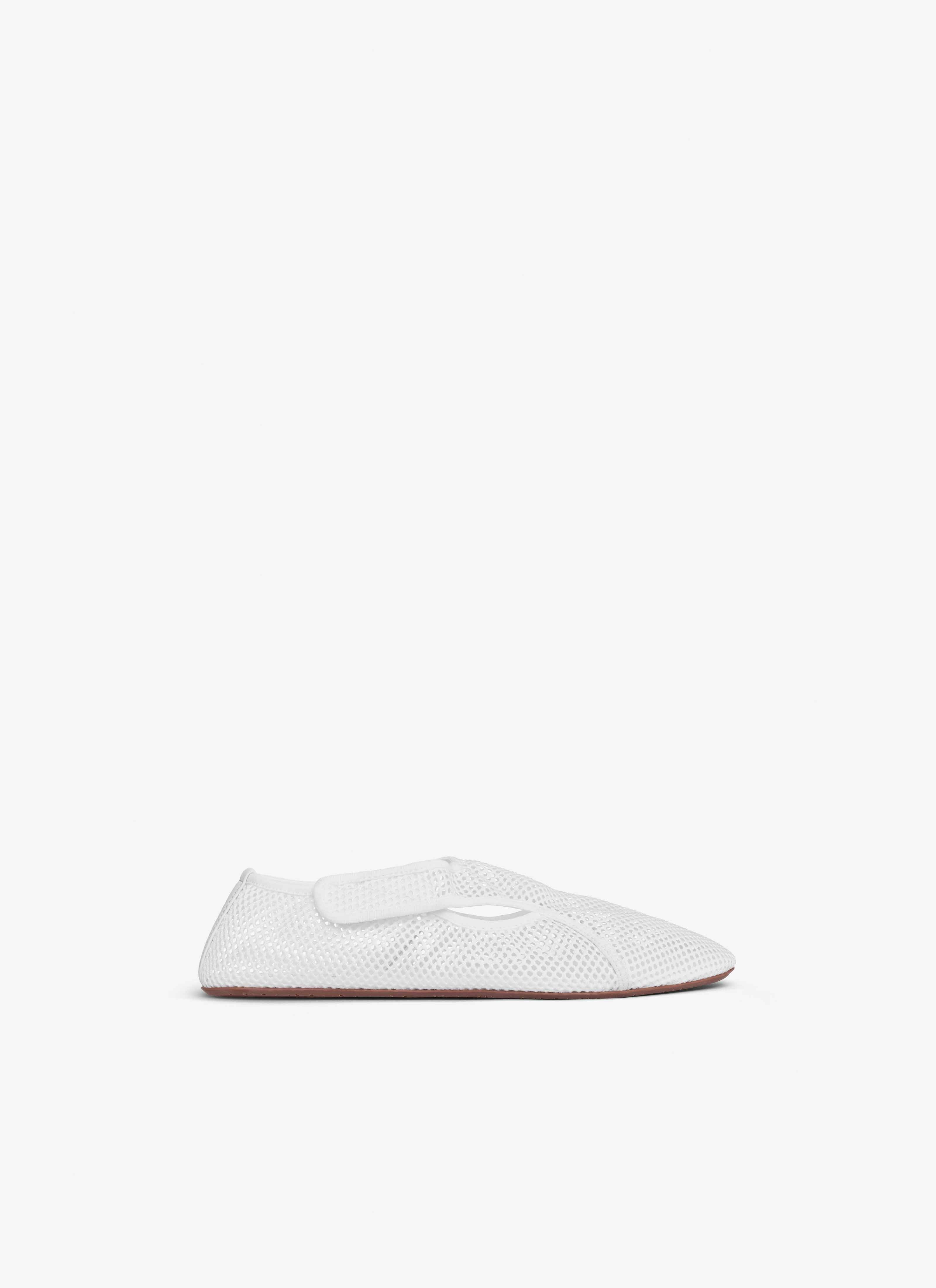 ALAÏA OPTIC WHITE SLIPPERS IN FISHNET