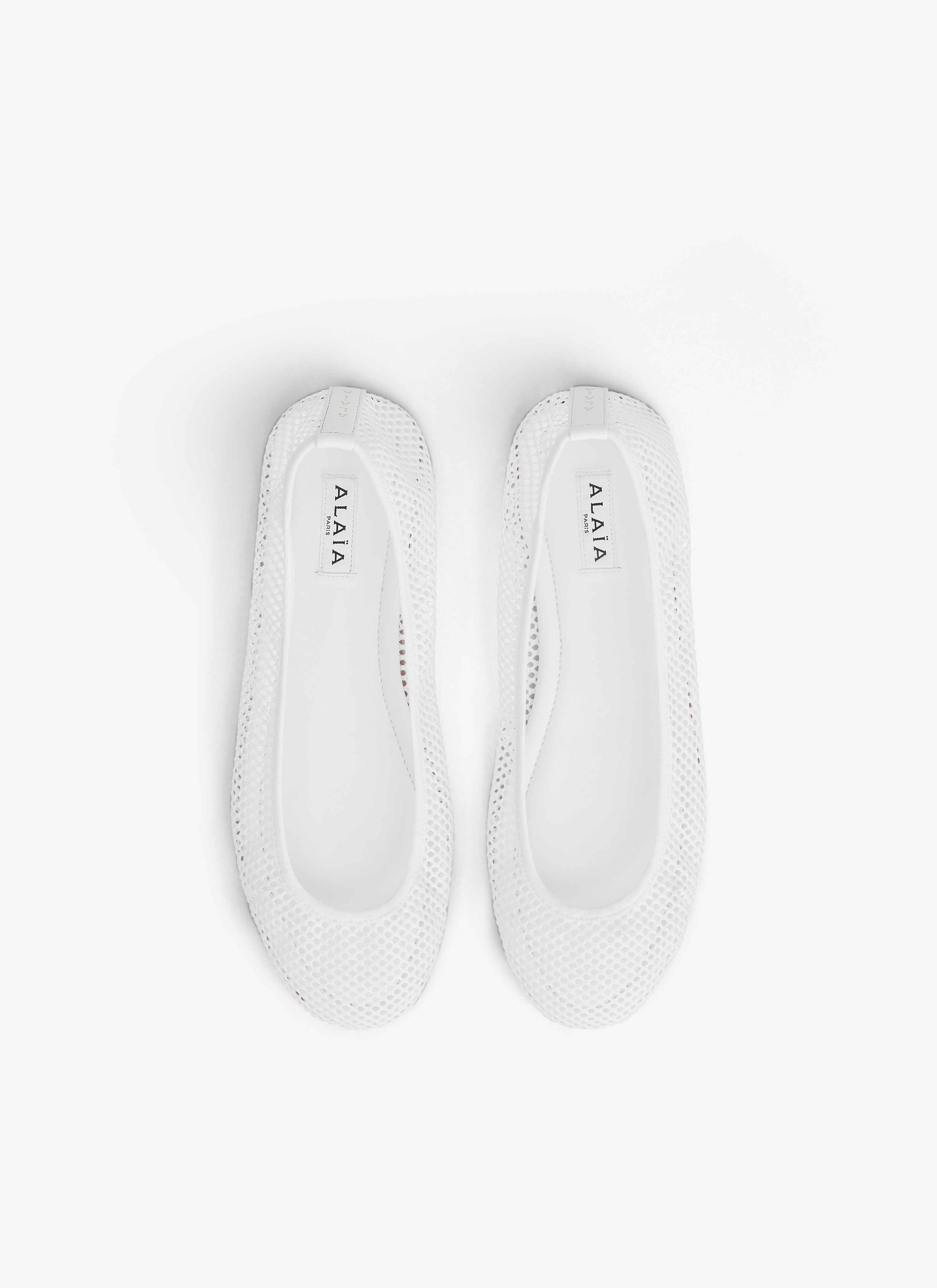 ALAÏA WHITE LOW VAMP BALLET FLATS IN FISHNET