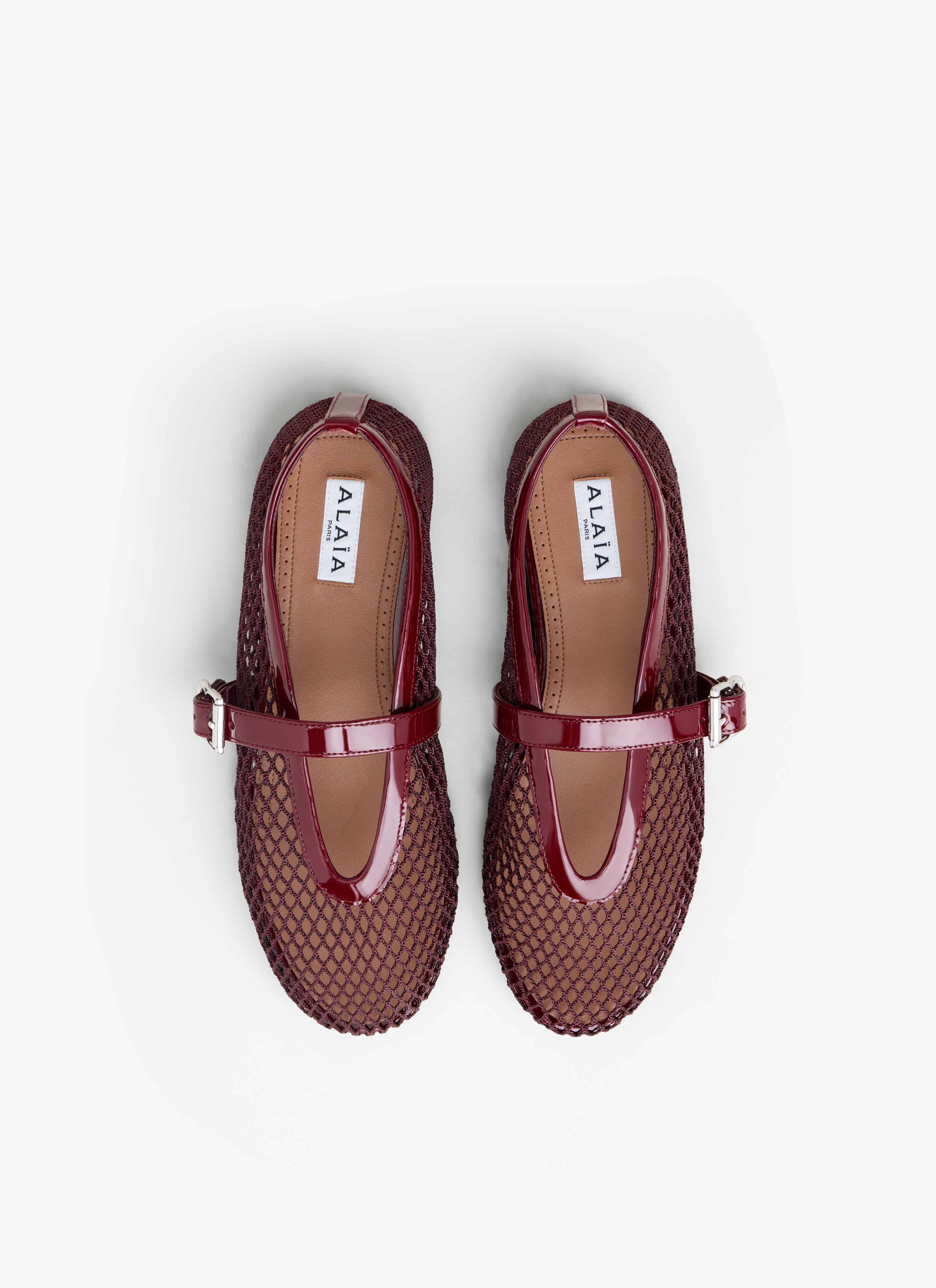 ALAÏA DARK RED BALLET FLATS IN FISHNET