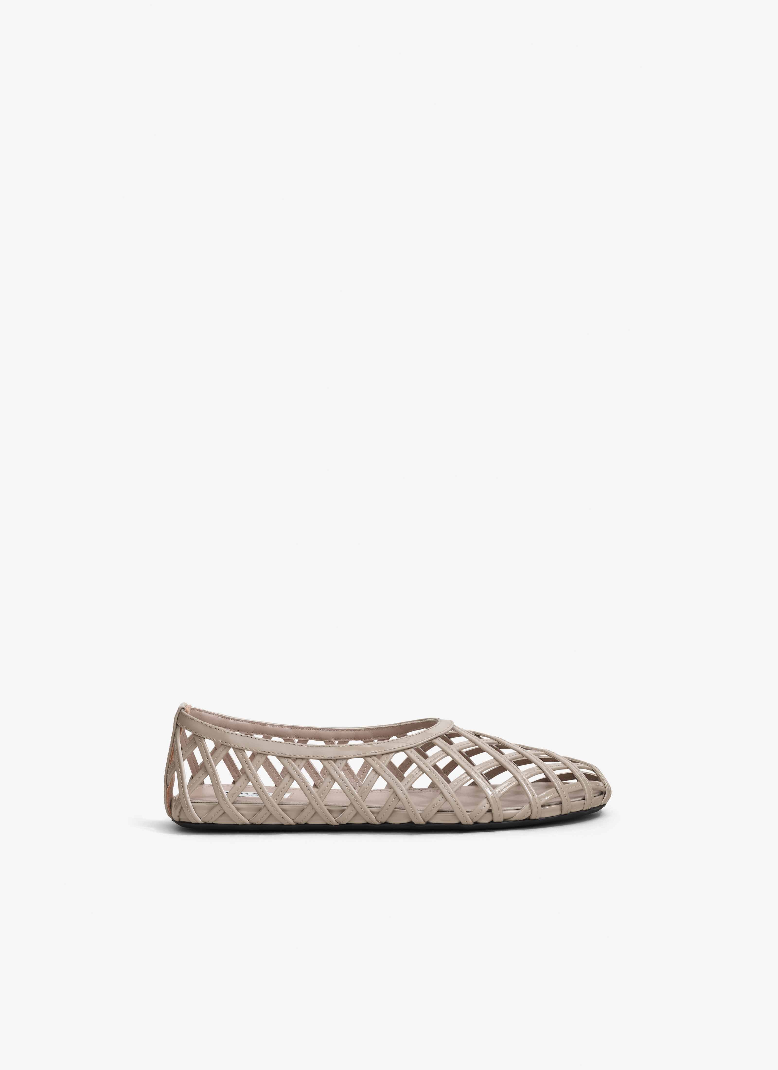 ALAÏA GREGE CAGE BALLET FLATS IN PATENT CALFSKIN