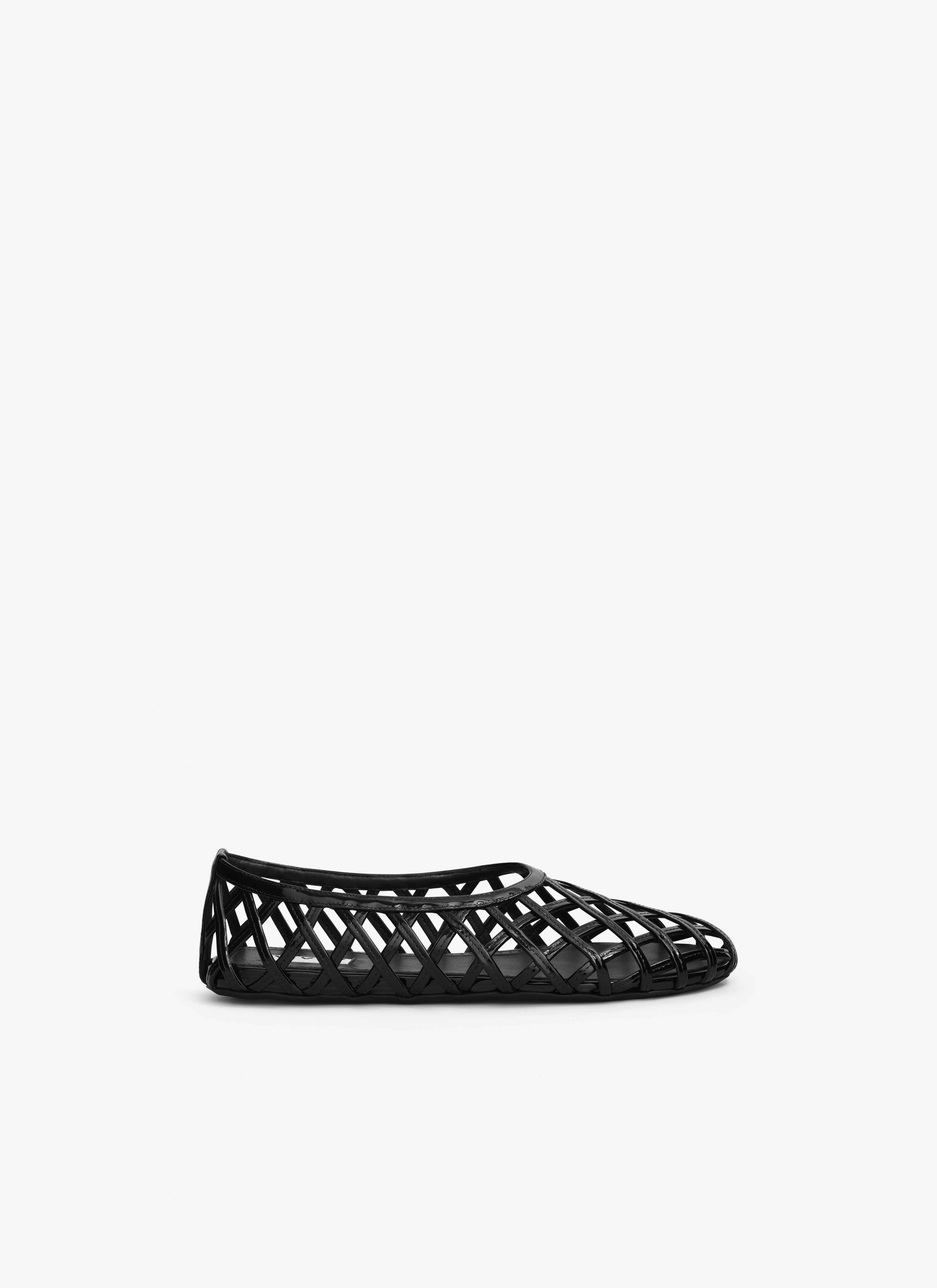 ALAÏA BALLERINES CAGE EN CUIR VERNI NOIR