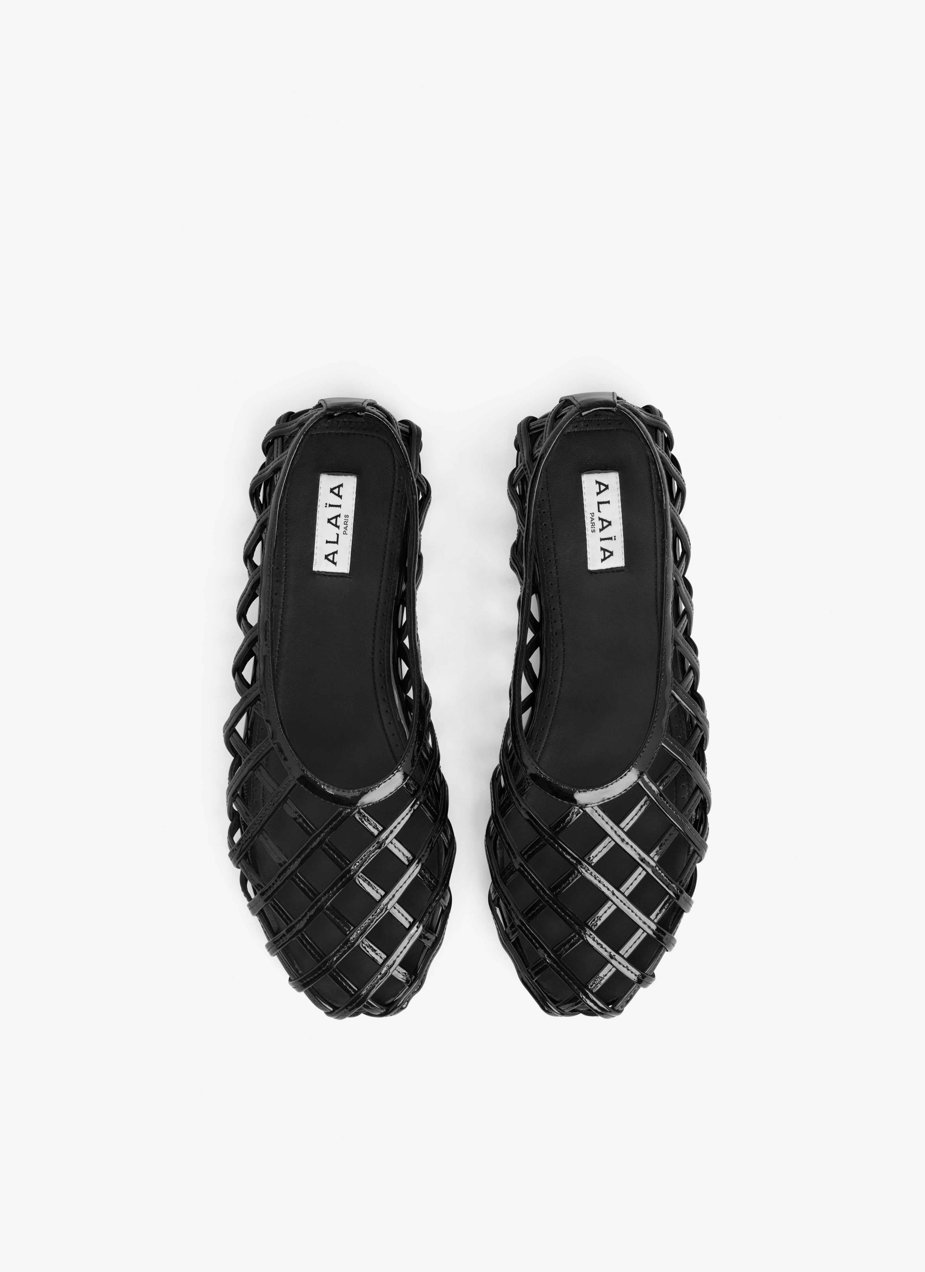 ALAÏA BALLERINES CAGE EN CUIR VERNI NOIR