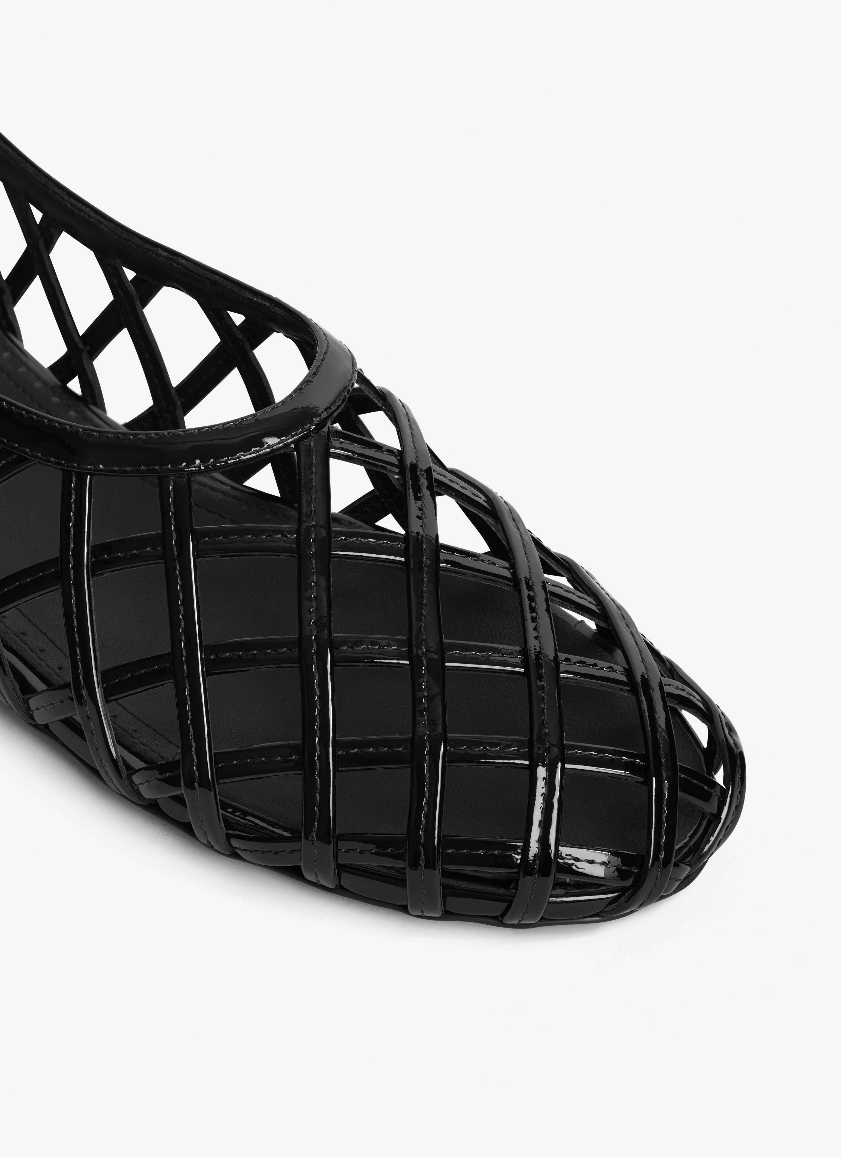 ALAÏA BLACK CAGE BALLET FLATS IN PATENT CALFSKIN