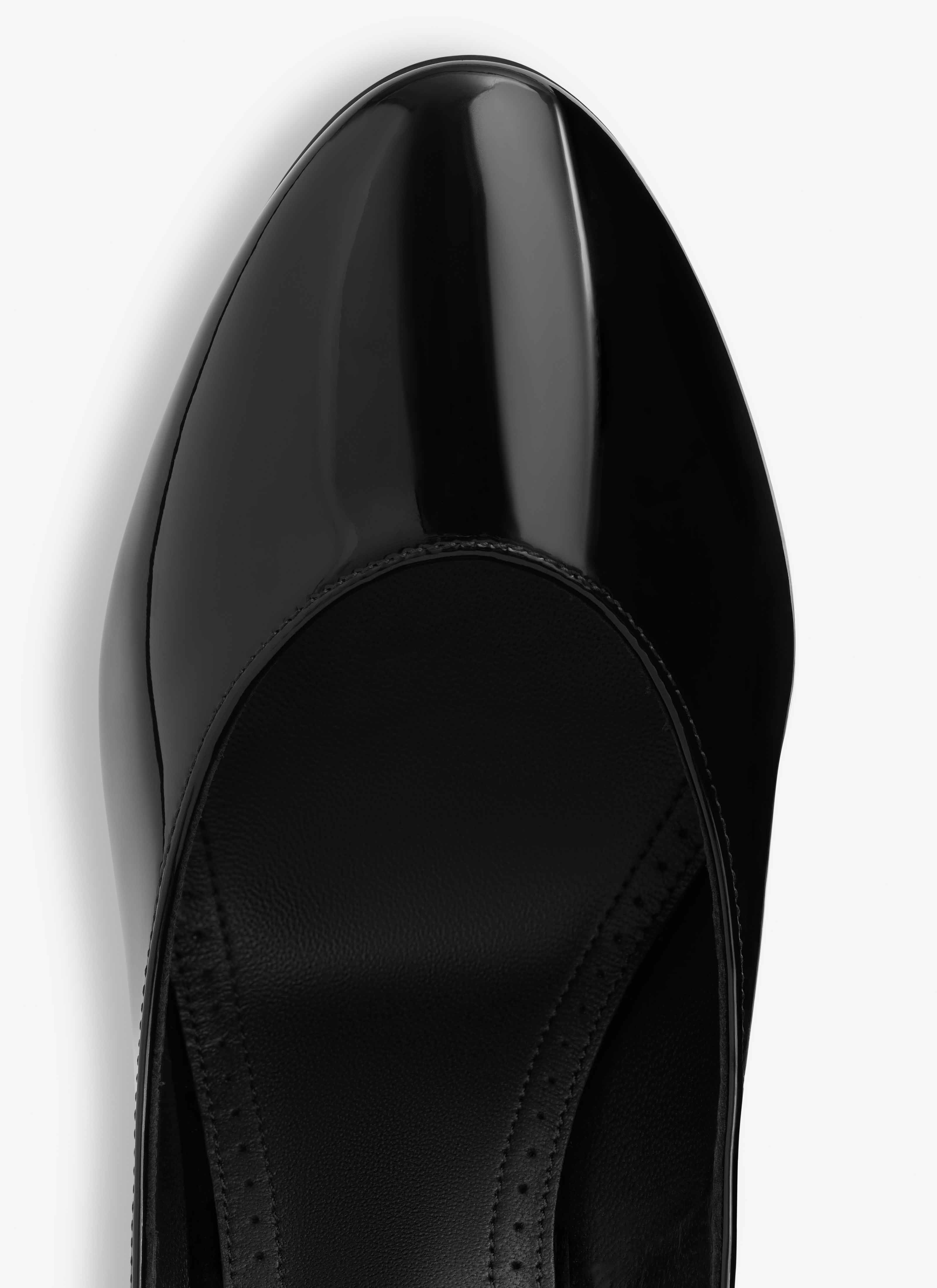 ALAÏA BLACK DÉCOLETTÉ PUMPS IN PATENT CALFSKIN