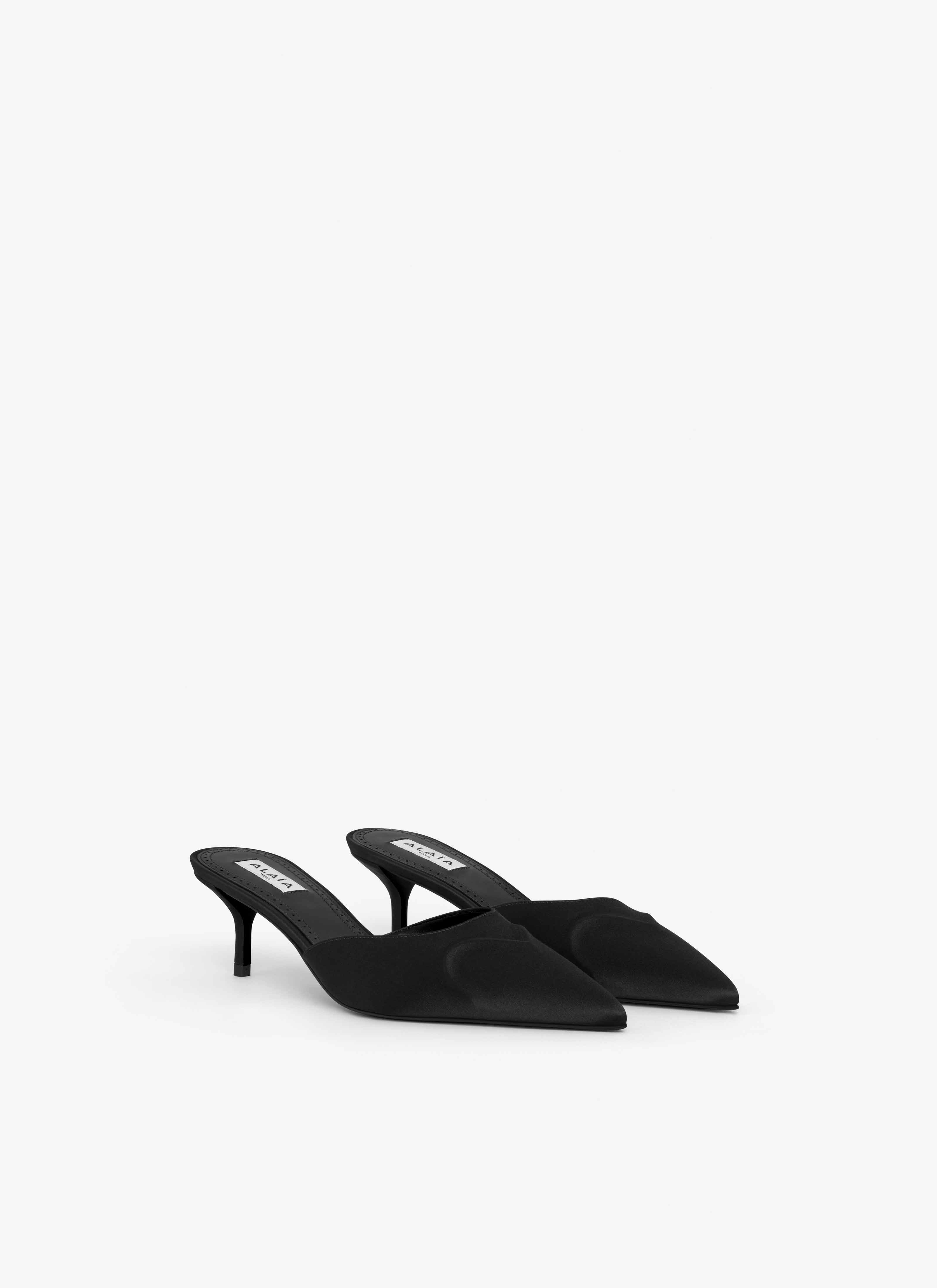 ALAÏA BLACK LE CŒUR 3D MULES IN SATIN