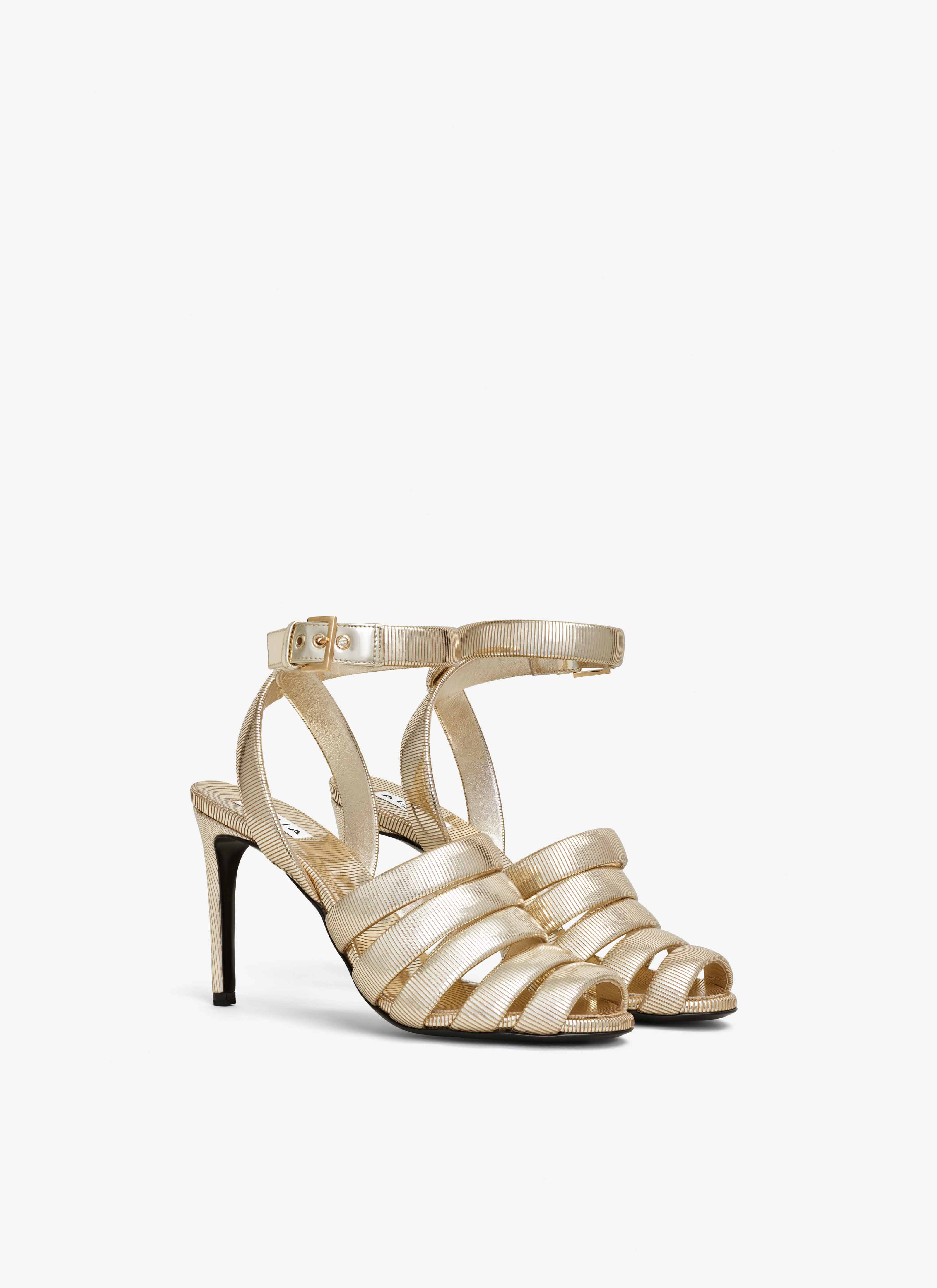 ALAÏA AMAZONITE CHAIN STRAPPY SANDALS IN METALLIZED LEATHER