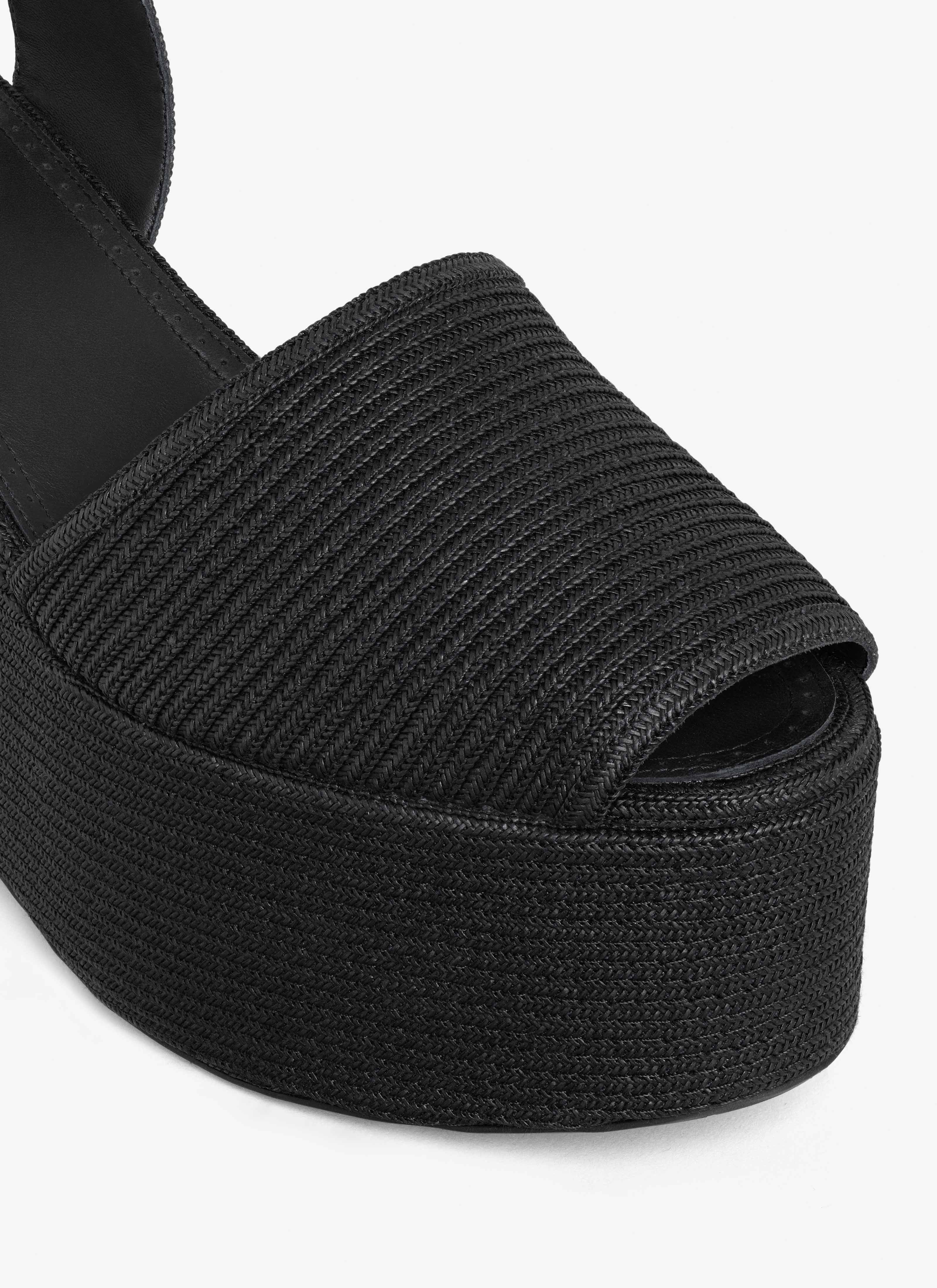 ALAÏA SANDALI WEDGE IN CANNUCCE DI CARTA NERO