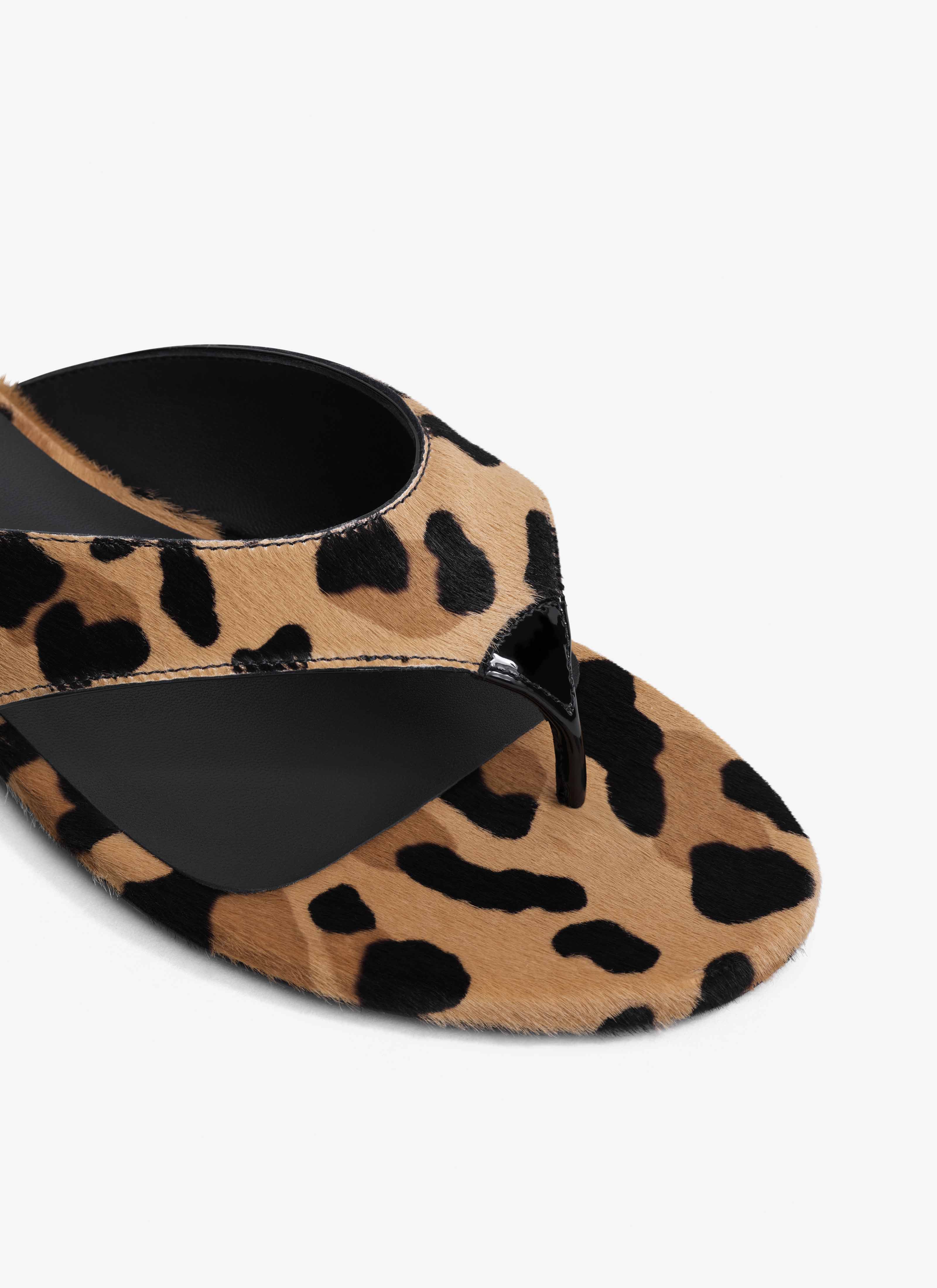 ALAÏA MARRÓN MULES PLANAS INFRADITO DE PIEL PONY LEOPARDO