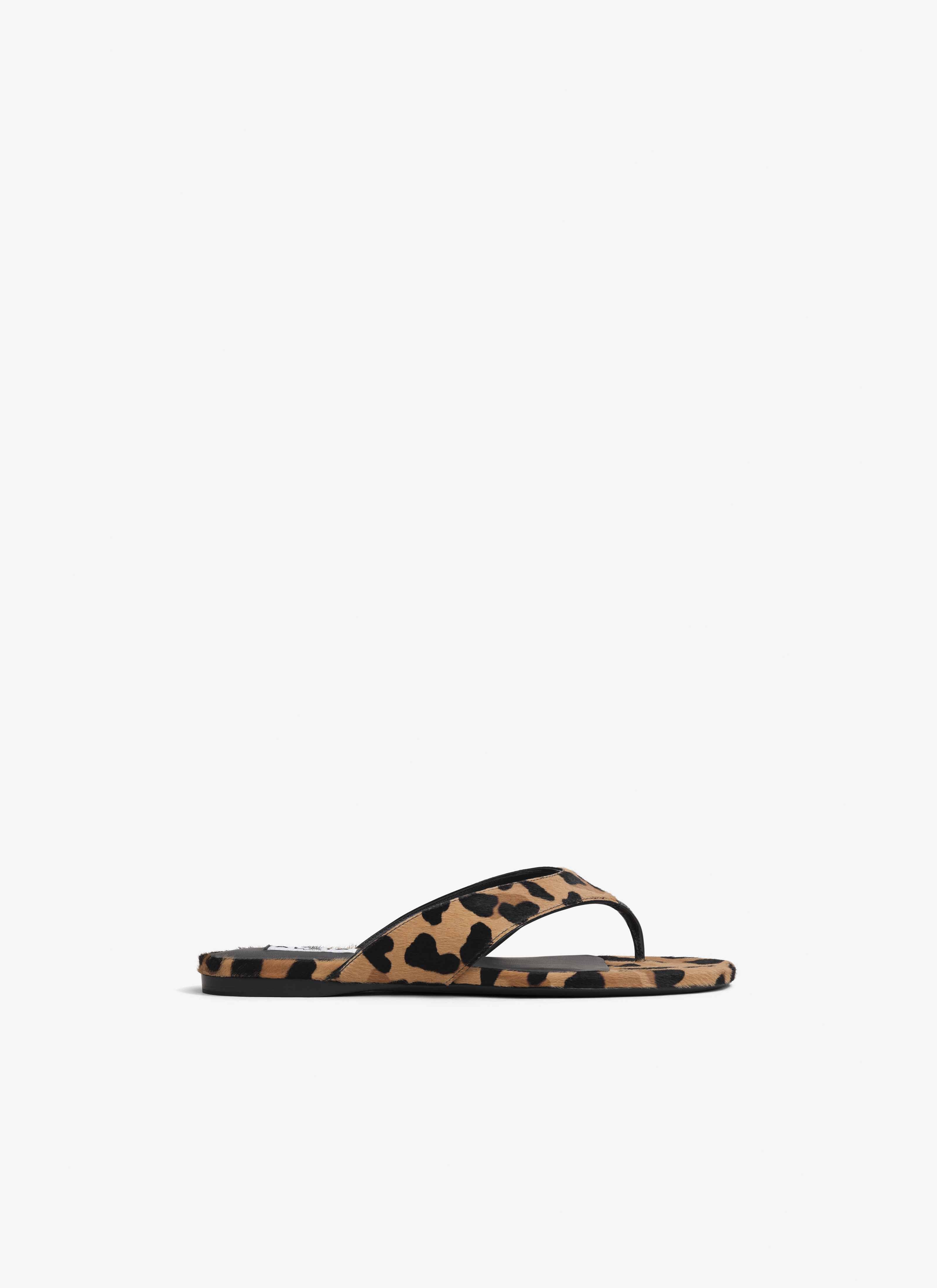 ALAÏA MARRÓN MULES PLANAS INFRADITO DE PIEL PONY LEOPARDO