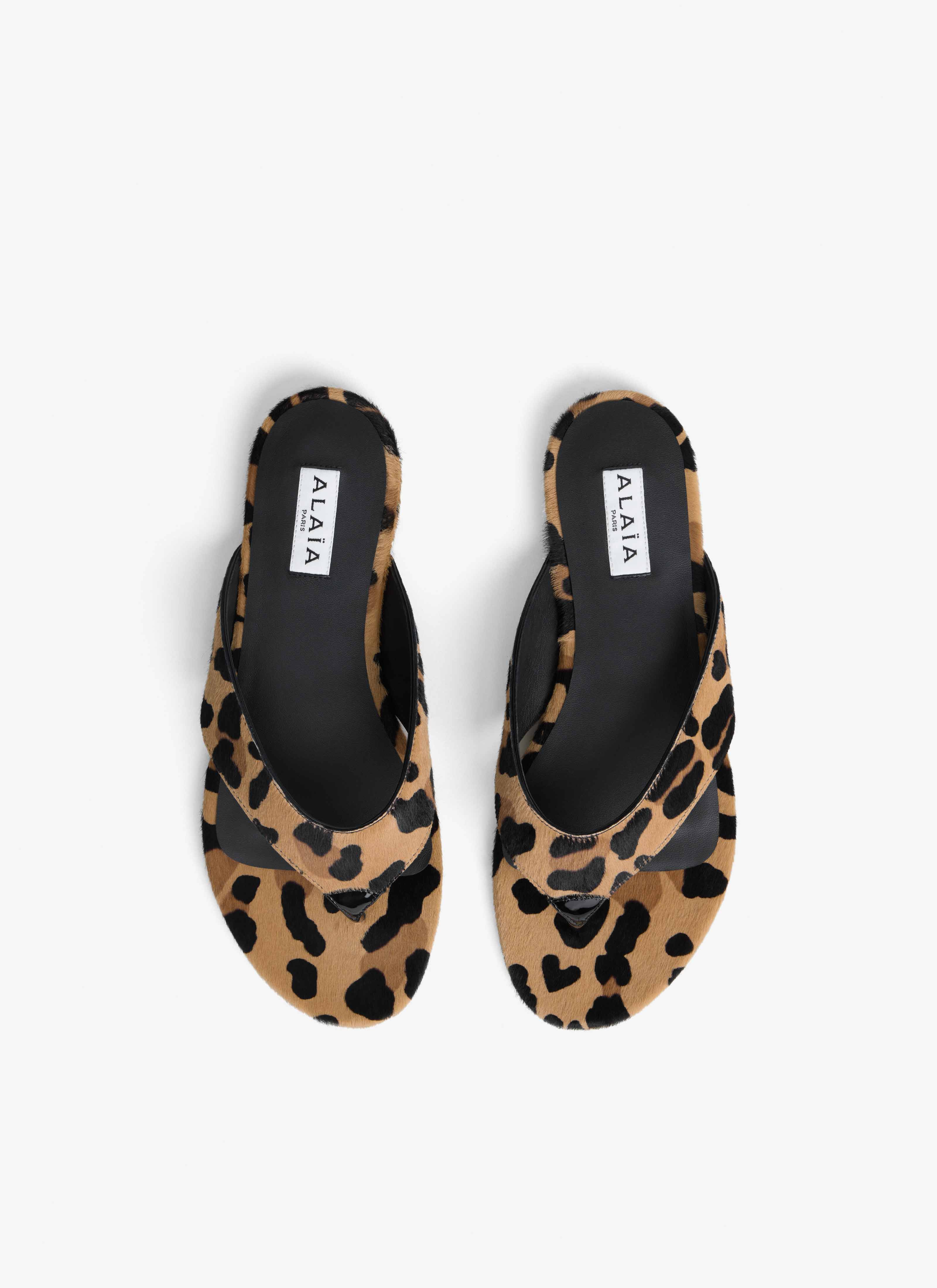 ALAÏA MARRÓN MULES PLANAS INFRADITO DE PIEL PONY LEOPARDO