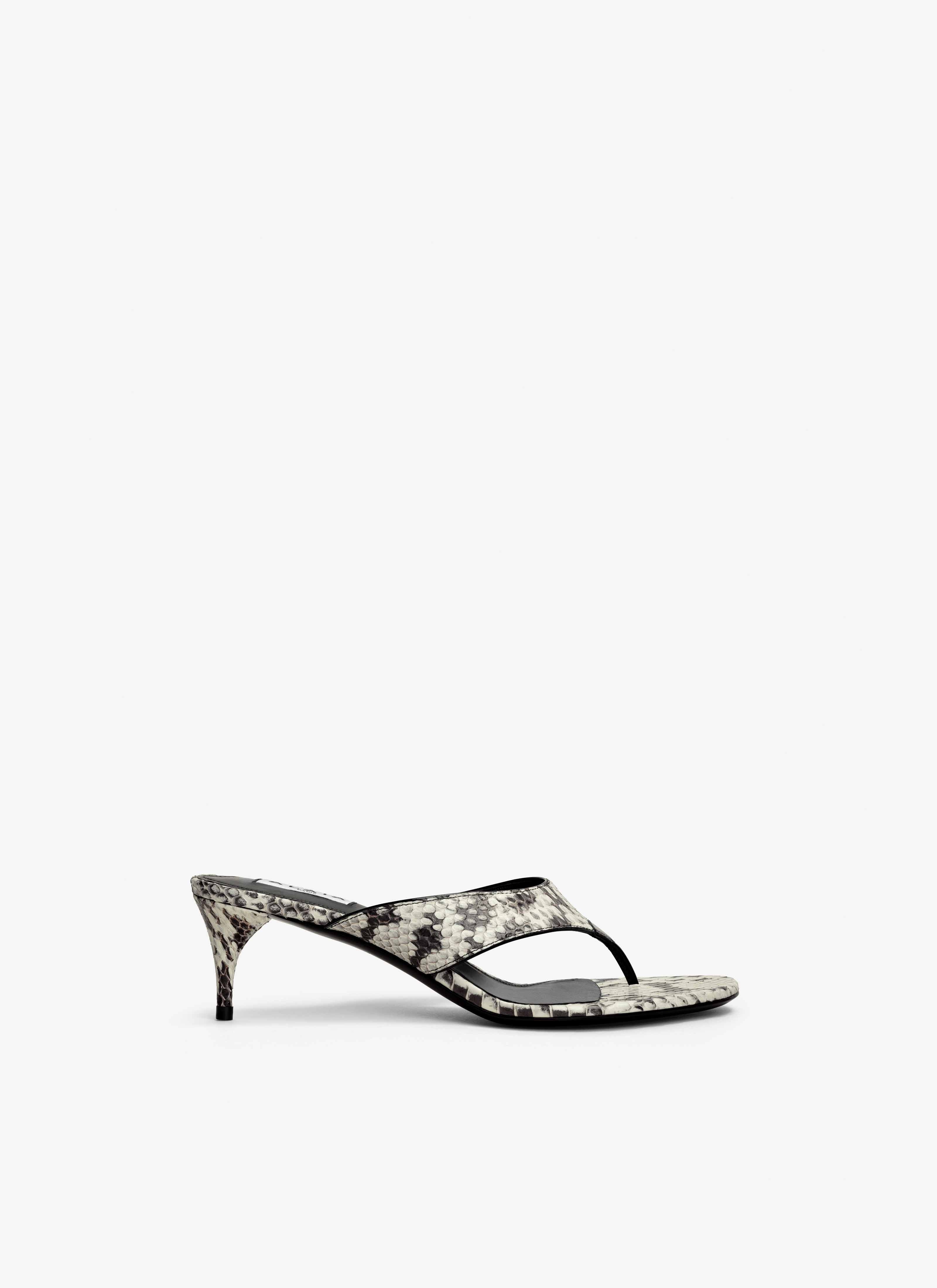 ALAÏA WHITE/BLACK INFRADITO THONG MULES IN ELAPHE