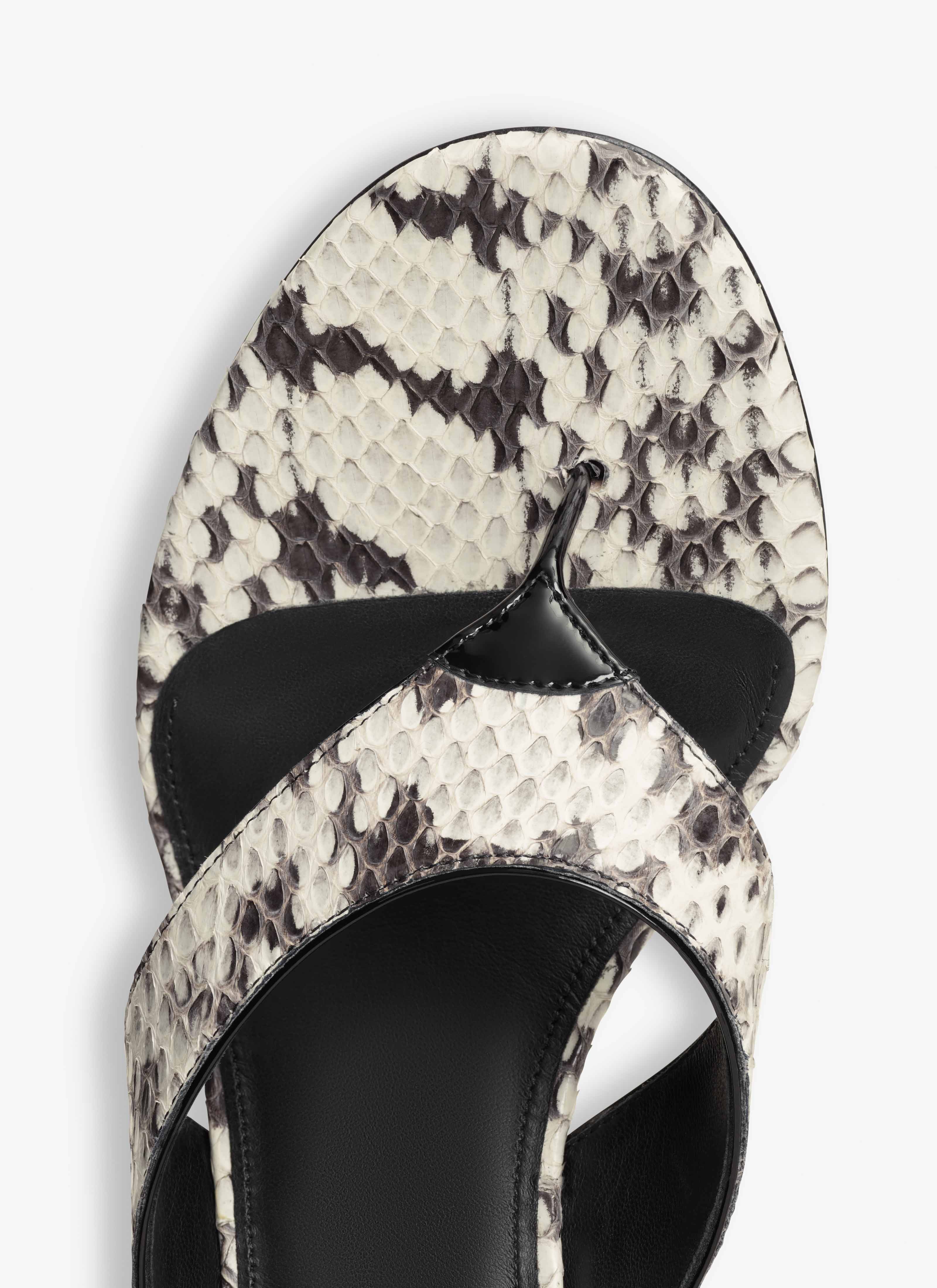 ALAÏA WHITE/BLACK INFRADITO THONG MULES IN ELAPHE