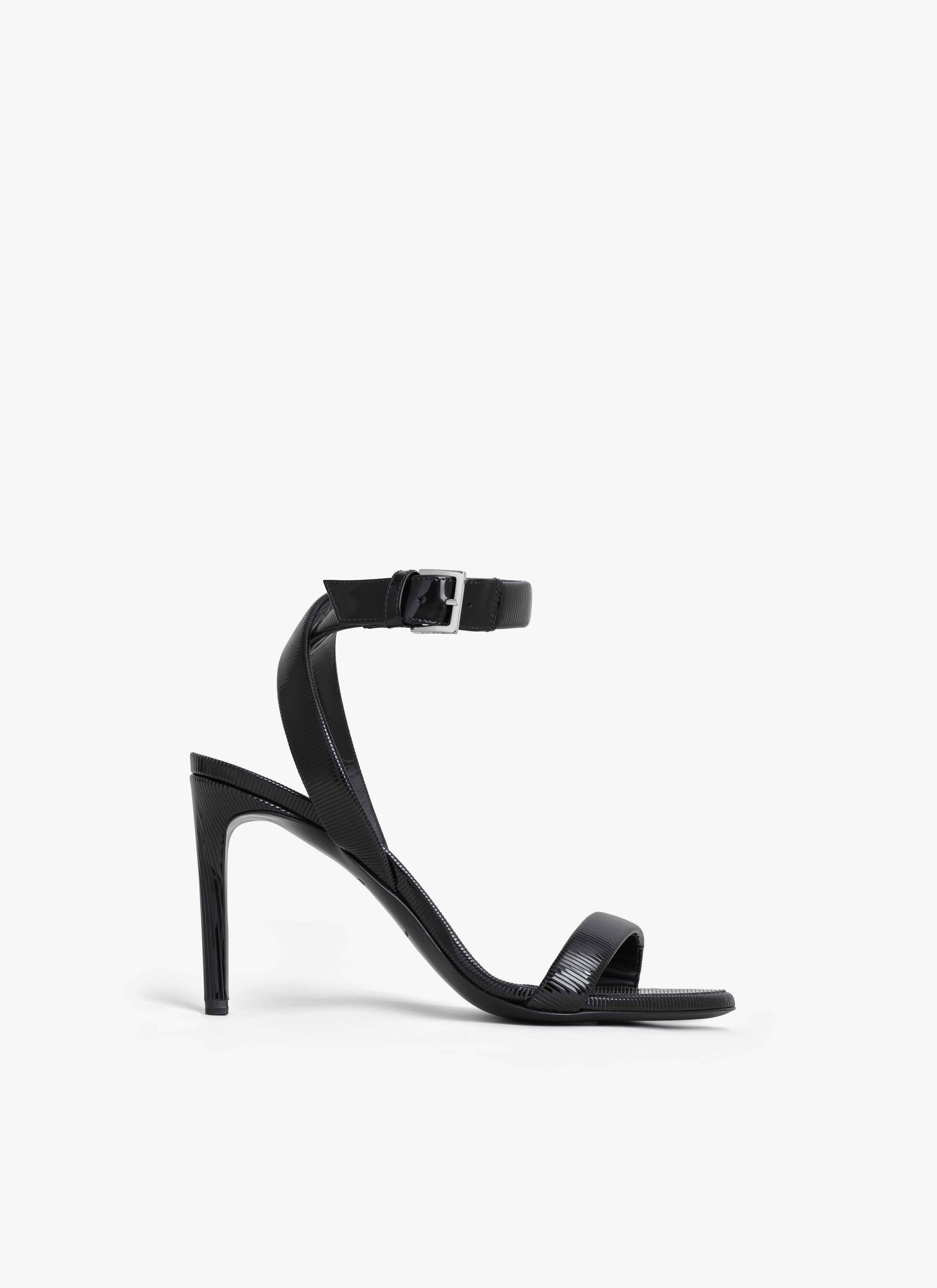 ALAÏA BLACK CHAIN SANDALS IN PATENT CALFSKIN