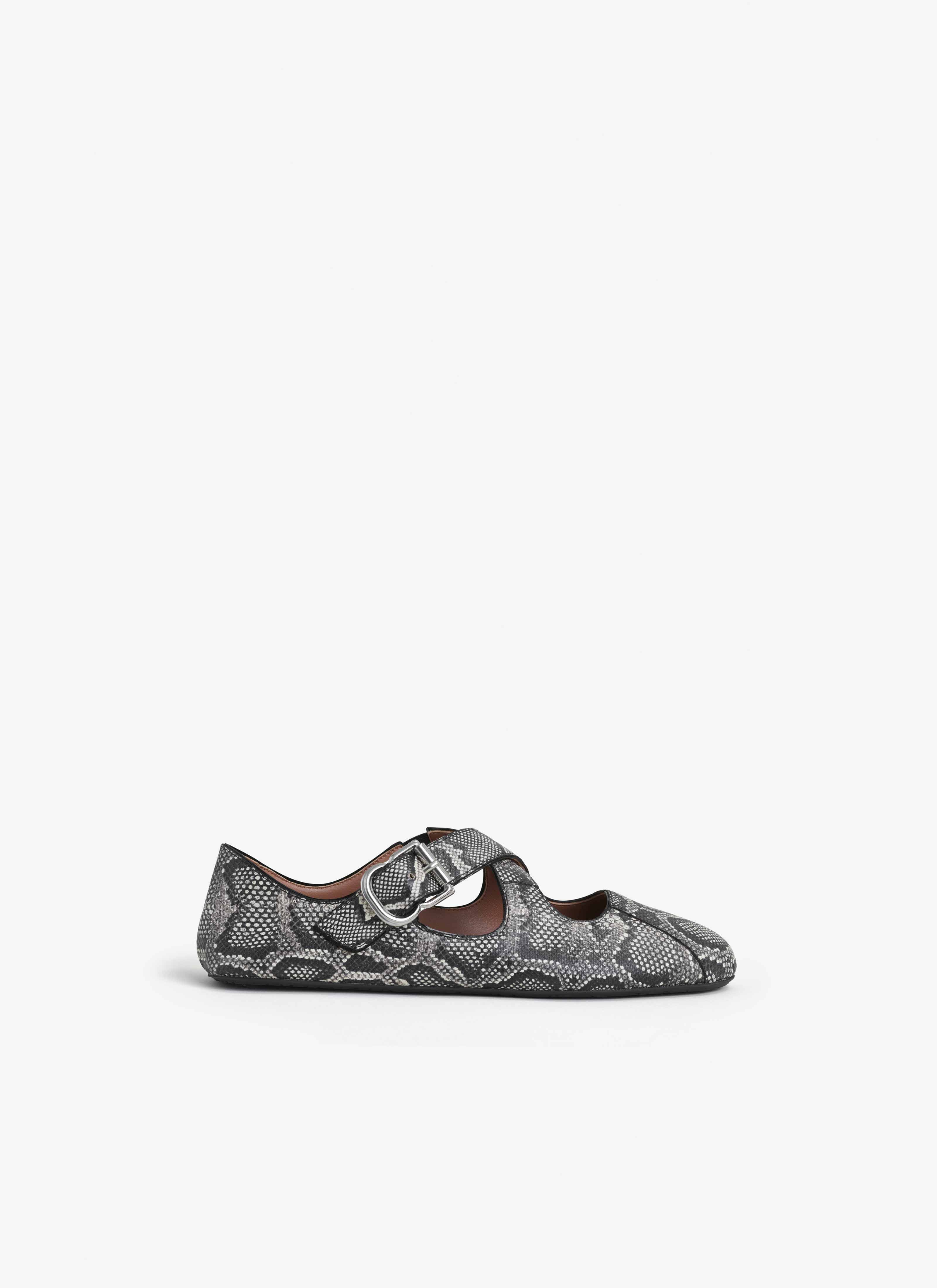 ALAÏA WHITE/BLACK CRISS CROSS BALLET FLATS IN KARUNG