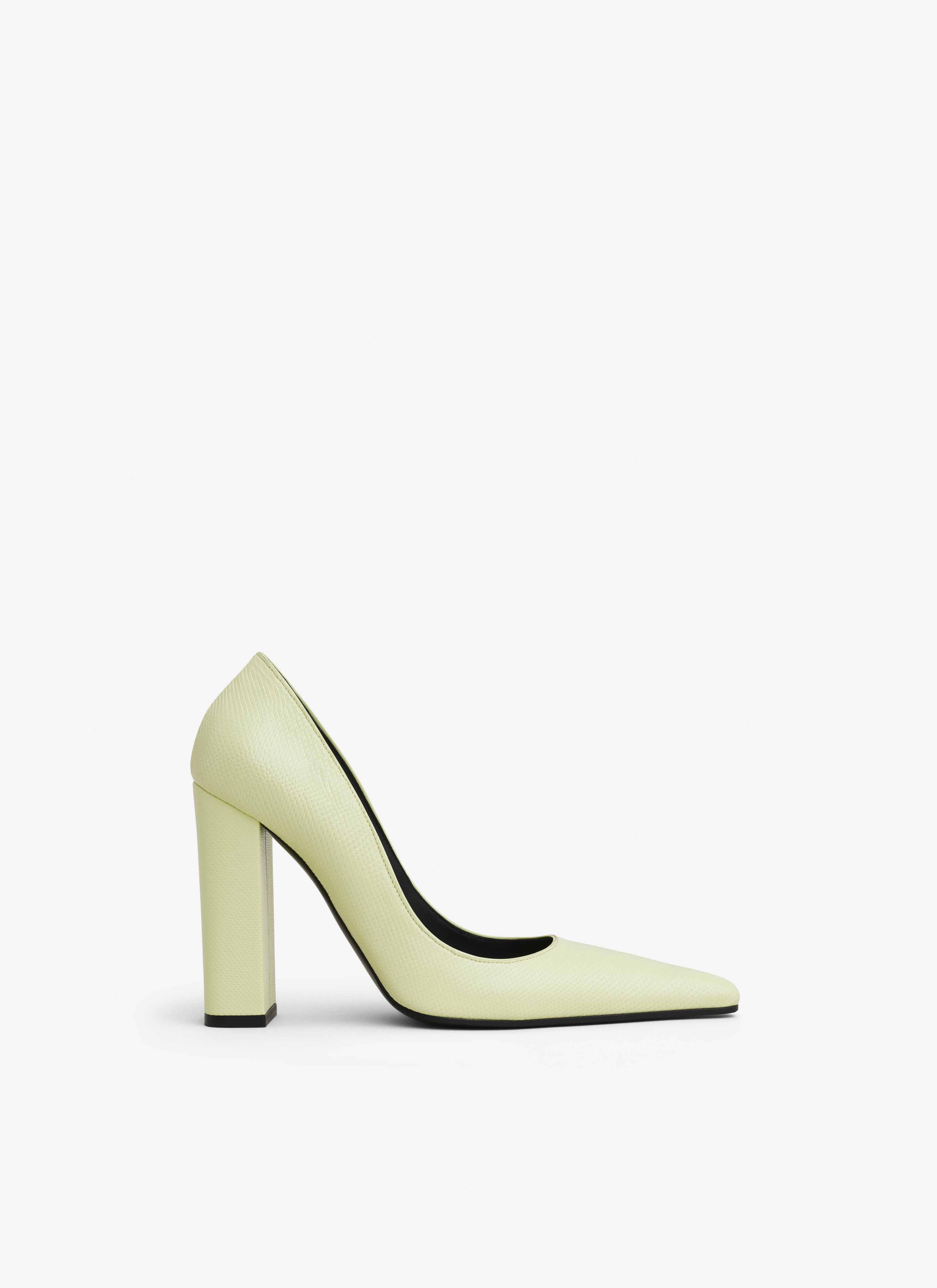 ALAÏA  POINTY PUMPS IN KARUNG SNAKE LEATHER
